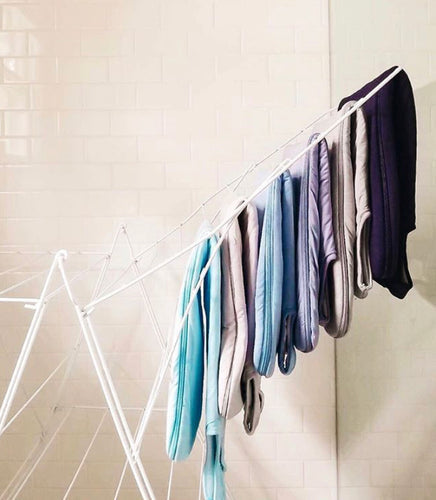 kyte baby sleep bags air drying on a drying rack