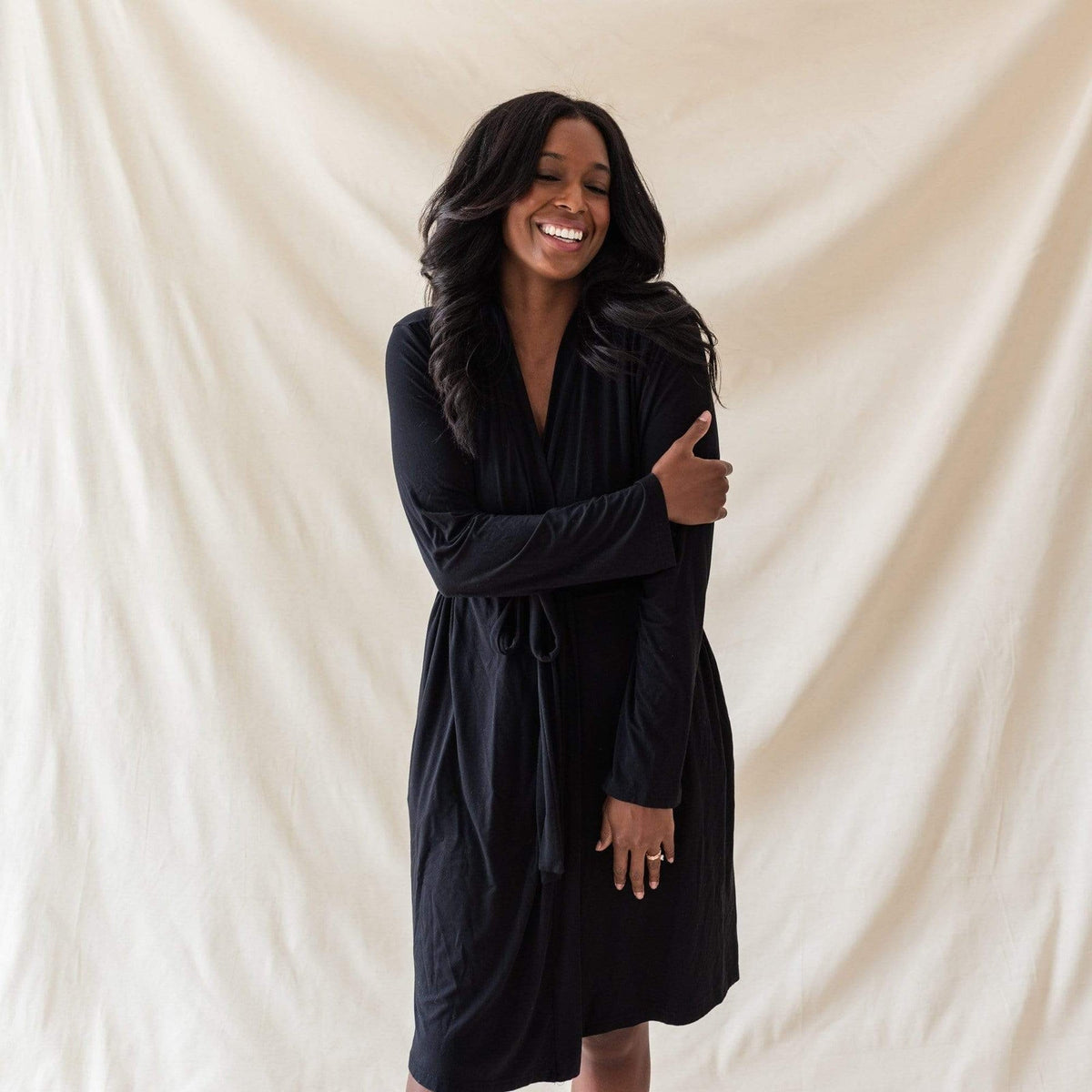 woman modeling lounge robe in midnight