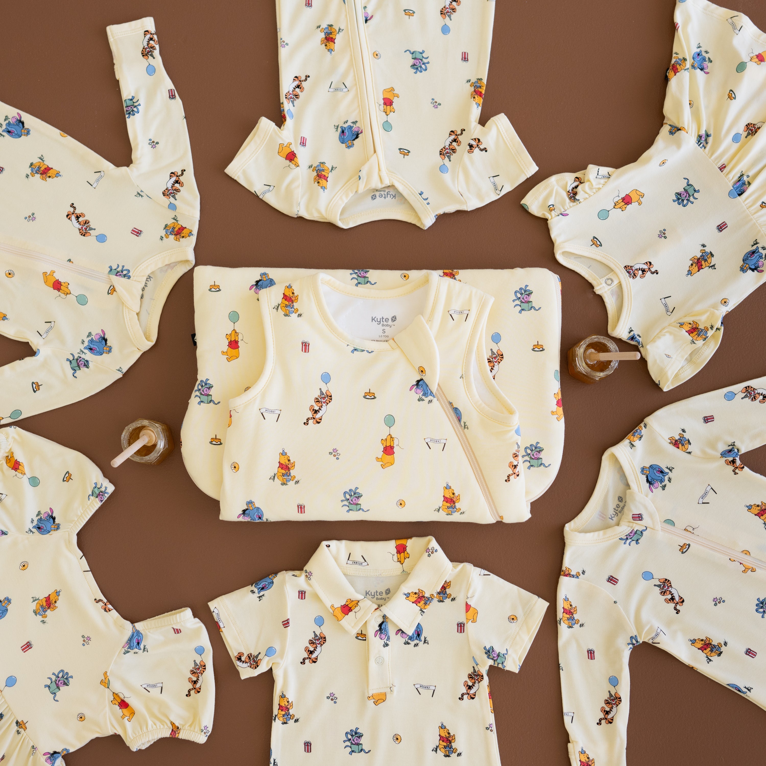 winnie the pooh kyte baby products on a brown background