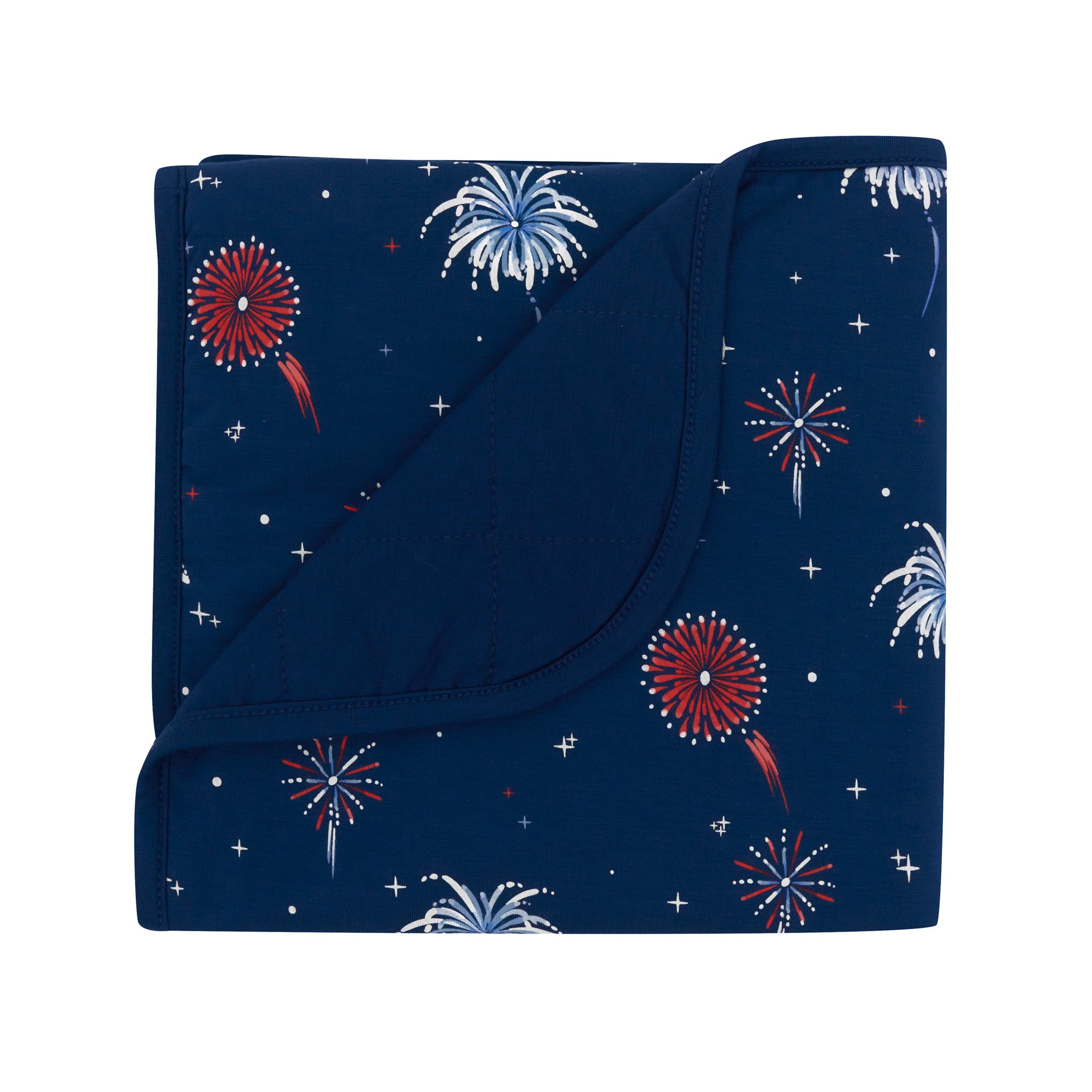 Baby Blanket in Celebration with the corner folded down showing the Tahoe colored backing