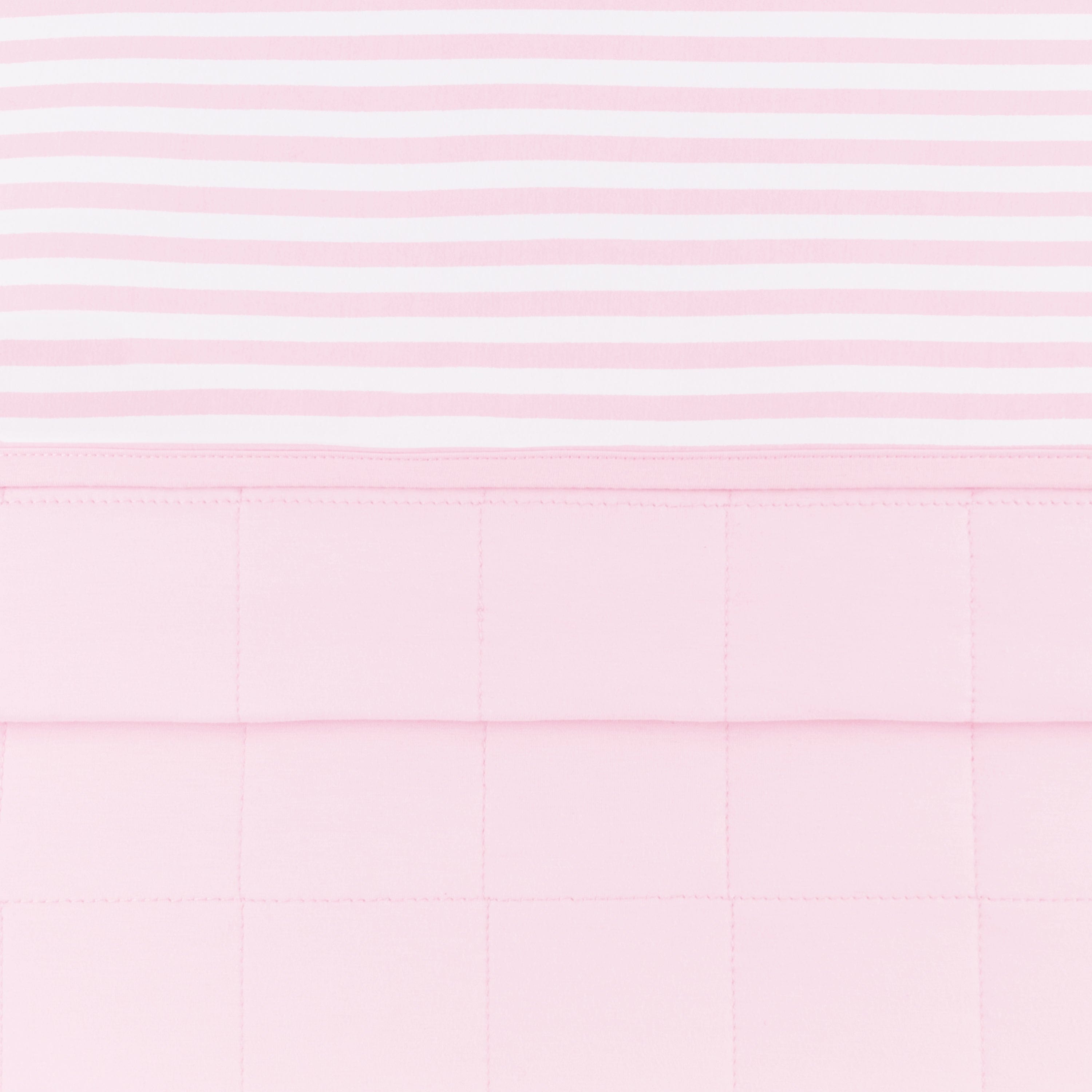 Toddler Blanket in Small Sakura Stripe 1.0 folded showing the quilted detail on the back of the blanket and the print detail on the front