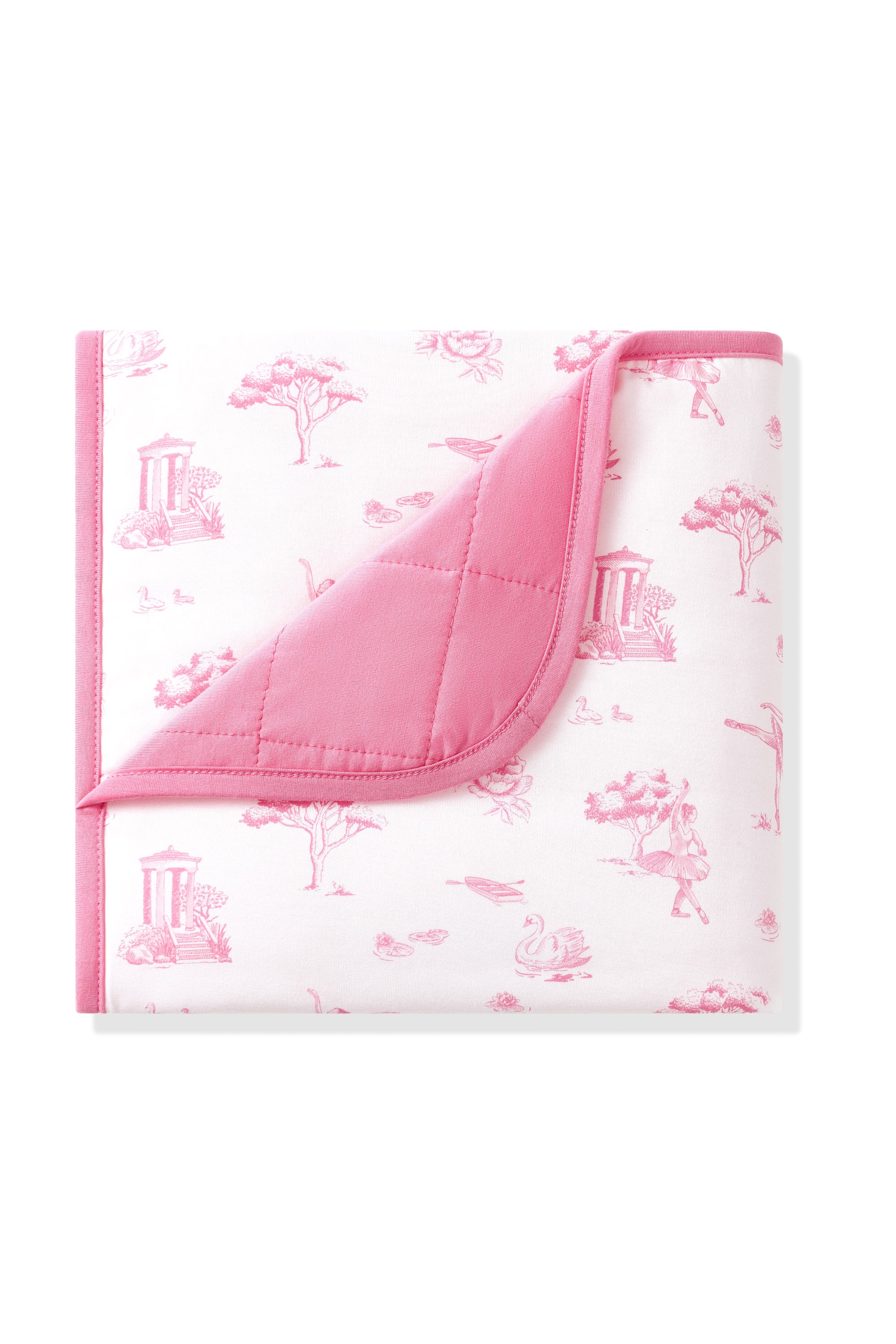 The Baby Blanket in Toile Ballet with the corner folded down showing the dark pink background