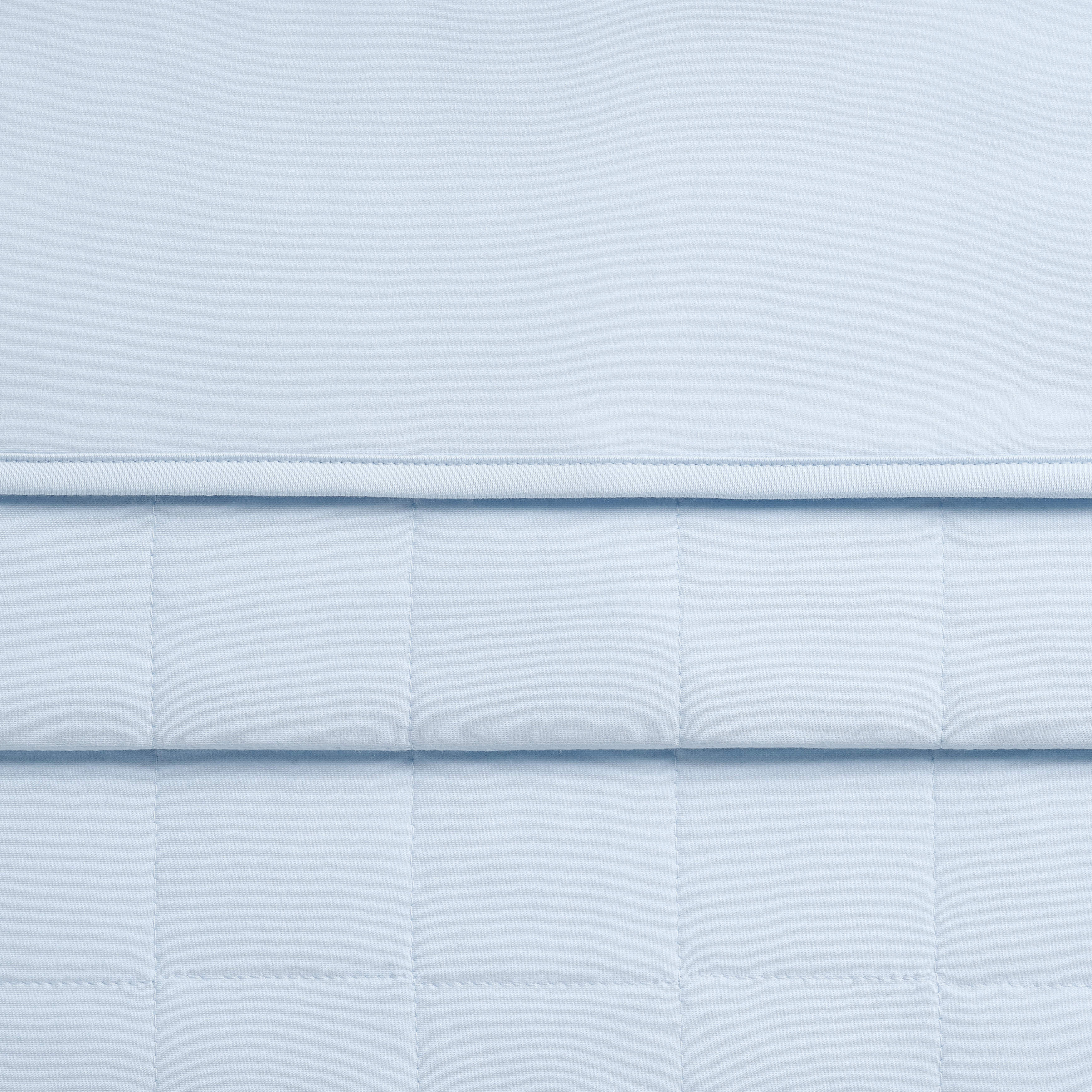 Close up of the quilted backing and smooth top of the Baby Blanket in Breeze 1.0