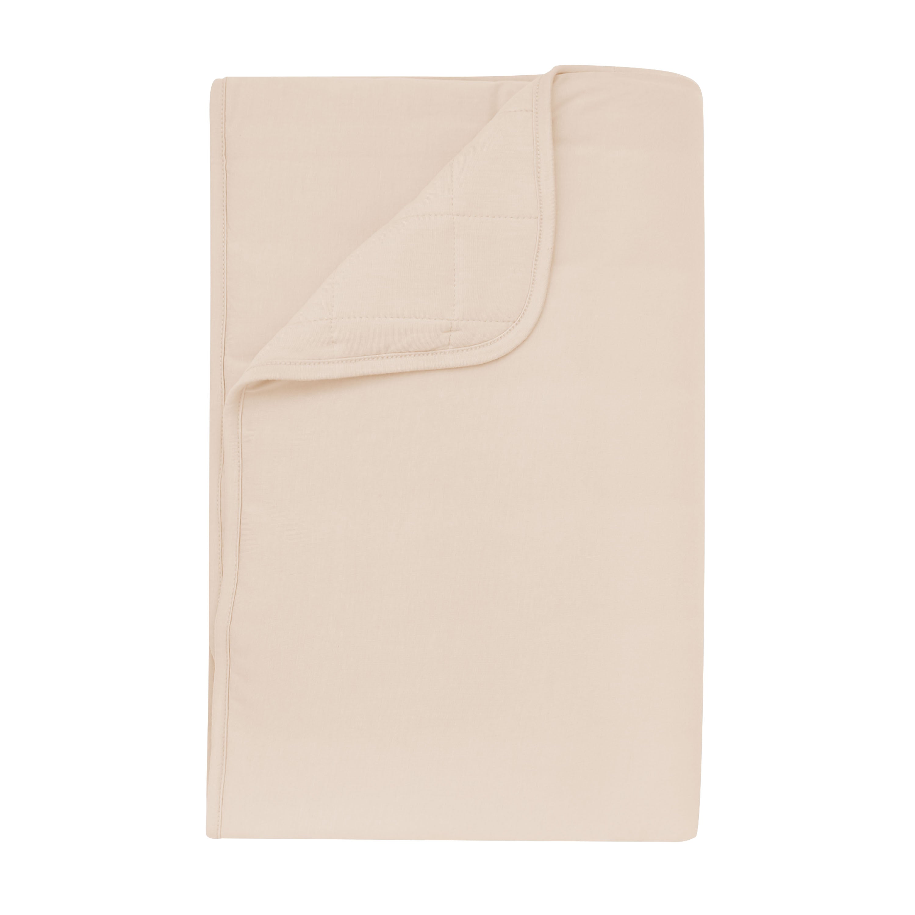 Product photo of the Toddler Blanket in Bisque 2.5 shown with corner flipped down