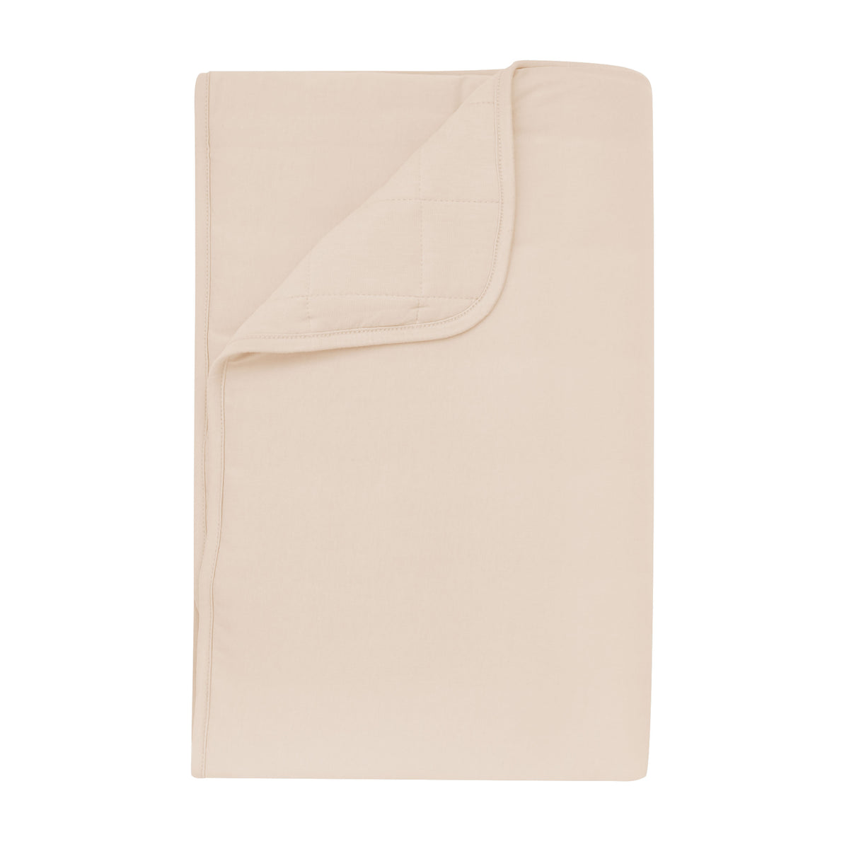 Product photo of the Toddler Blanket in Bisque 2.5 shown with corner flipped down