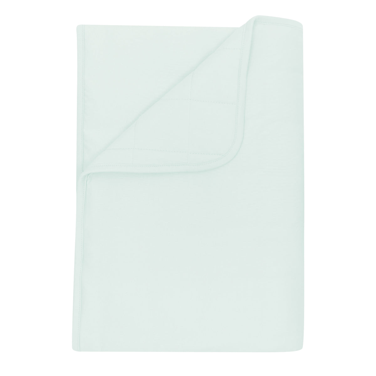 Toddler Blanket in Dew 2.5 shown with a corner flipped down showing the quilted backing