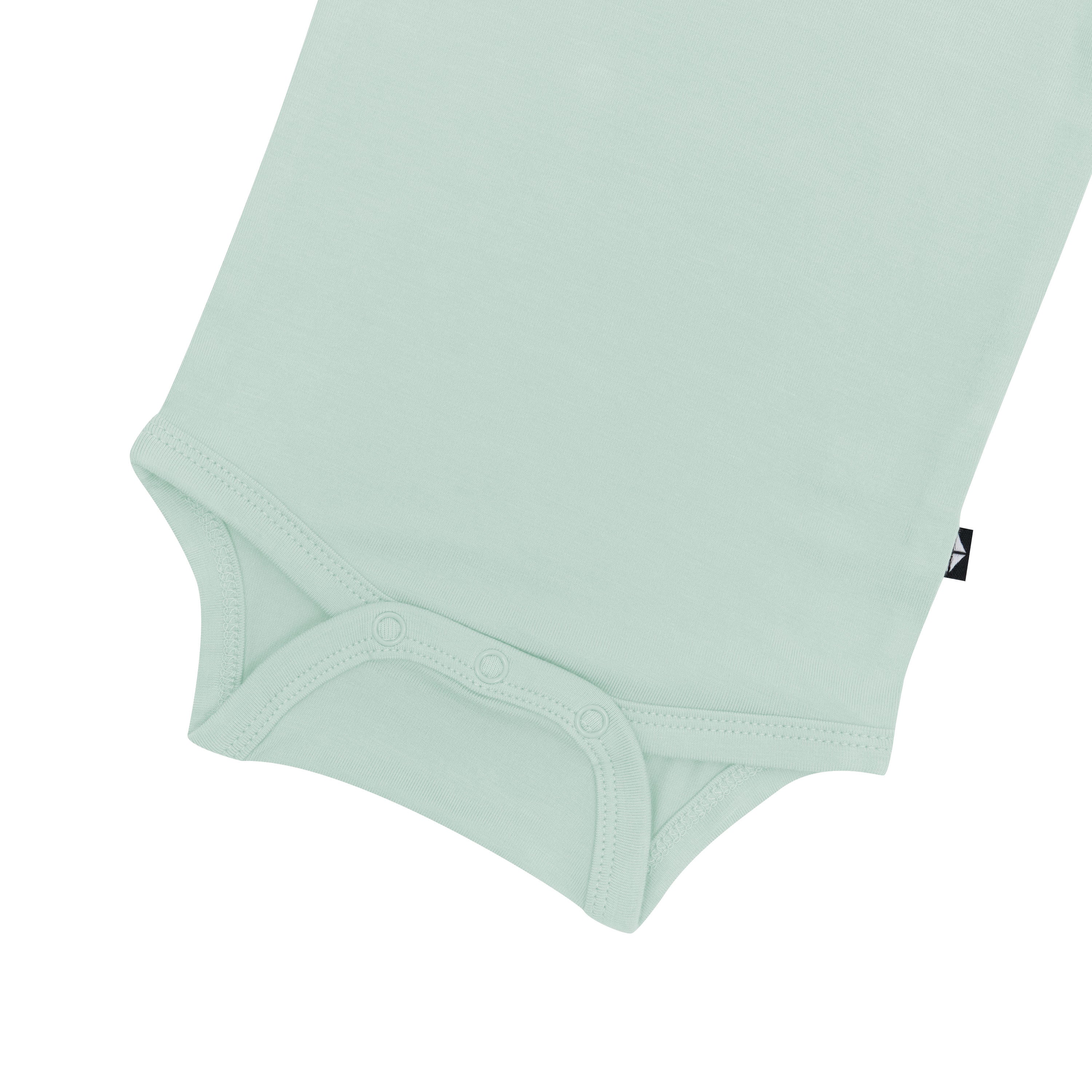 Close up of the snaps on the Kyte Baby Bodysuit in Sage