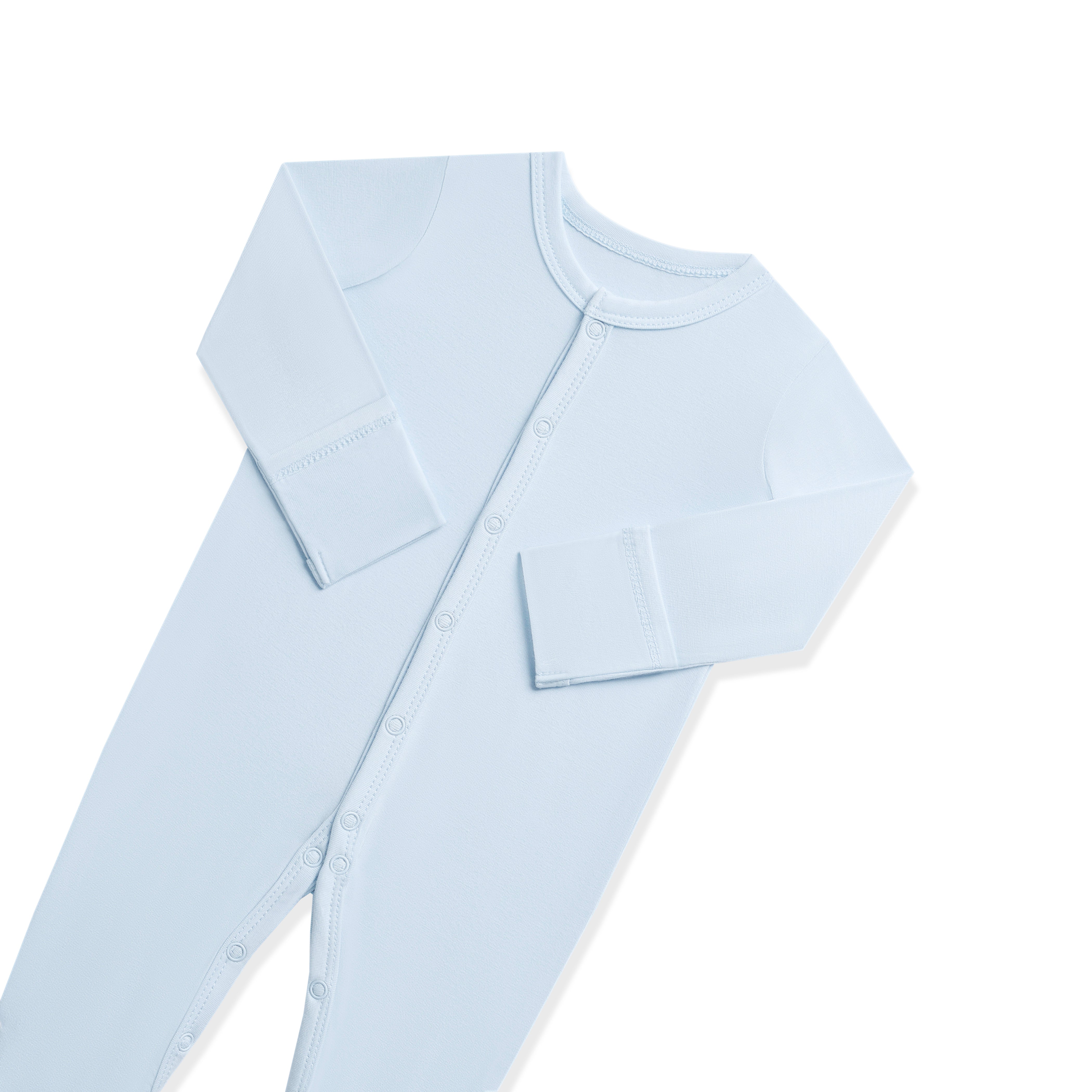 Close up of the snap closures and fold over hand cuffs shown on the Footie in Breeze