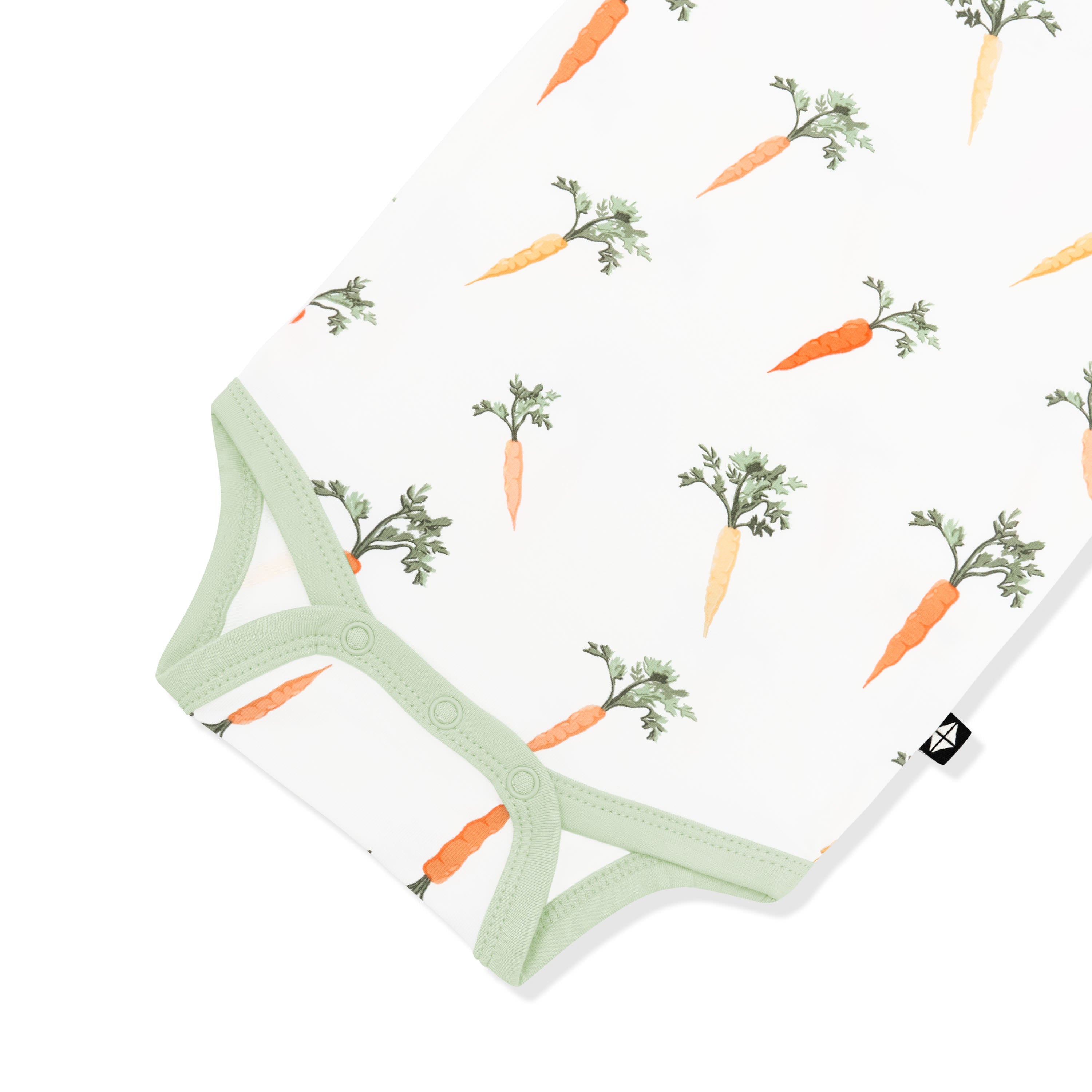 Close up of the snap closure on the Bodysuit in Carrot