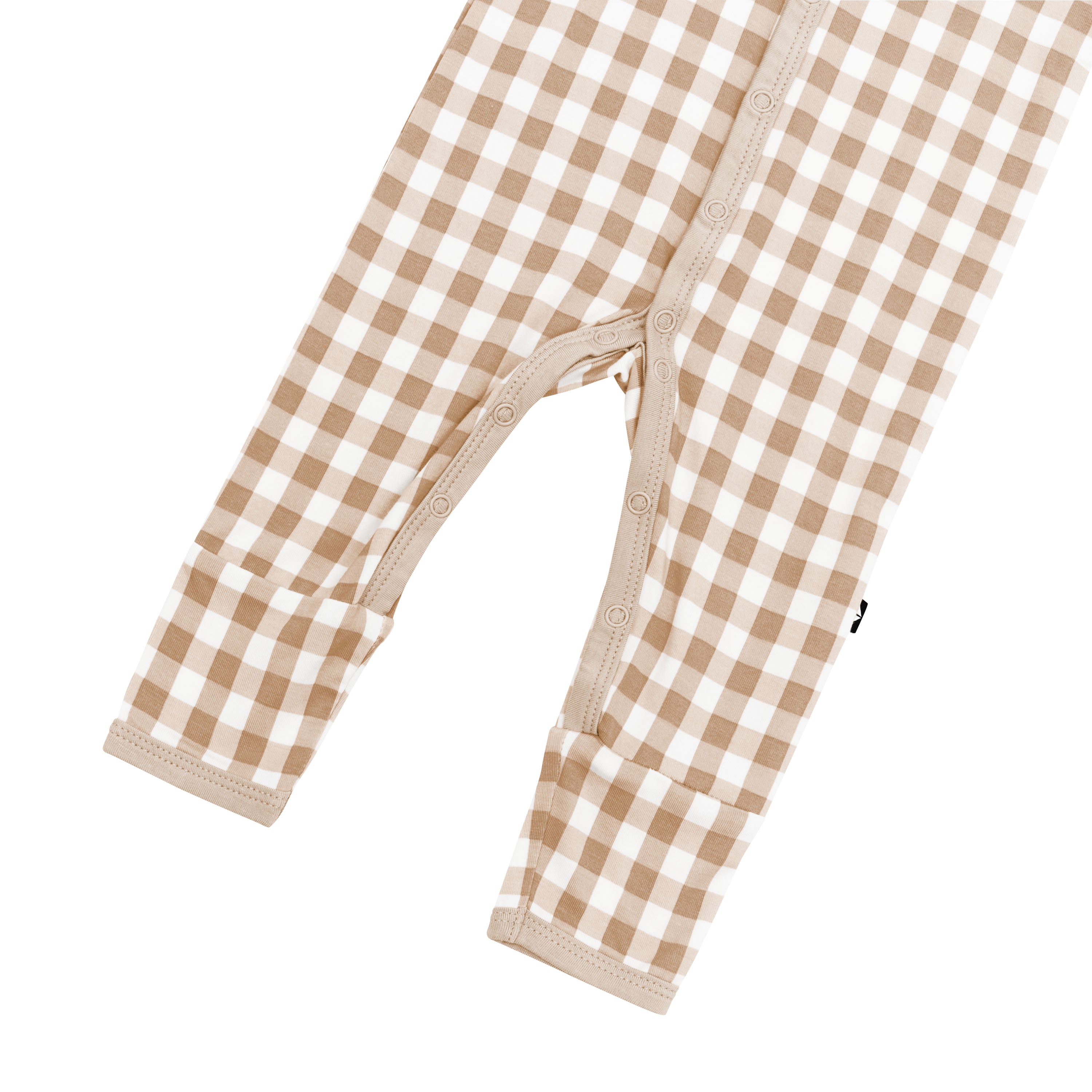 Snap closures shown on the legs of the Romper in Gingham Bisque
