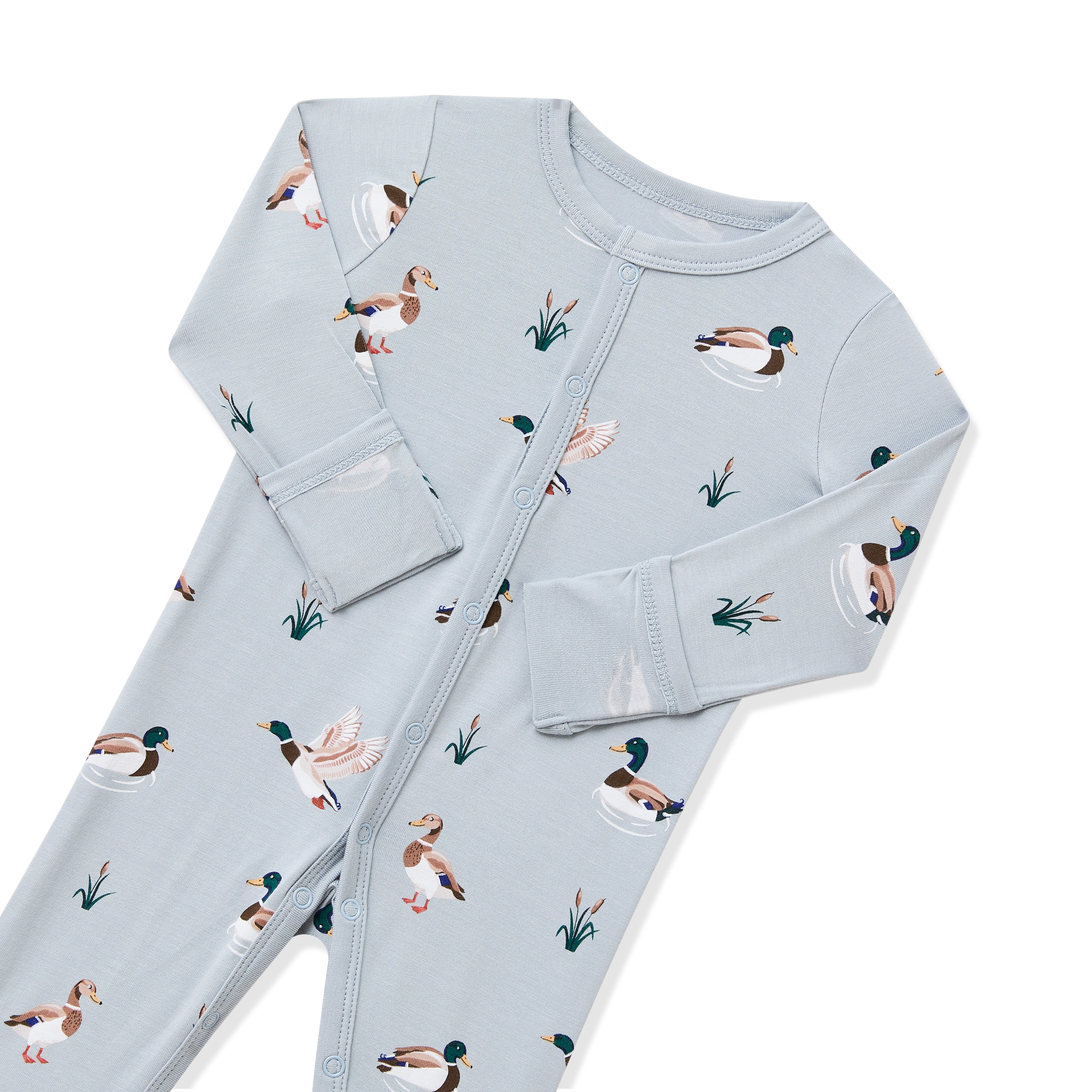 Close up of snap closures and fold over hand cuffs on the Romper in Mallard Duck