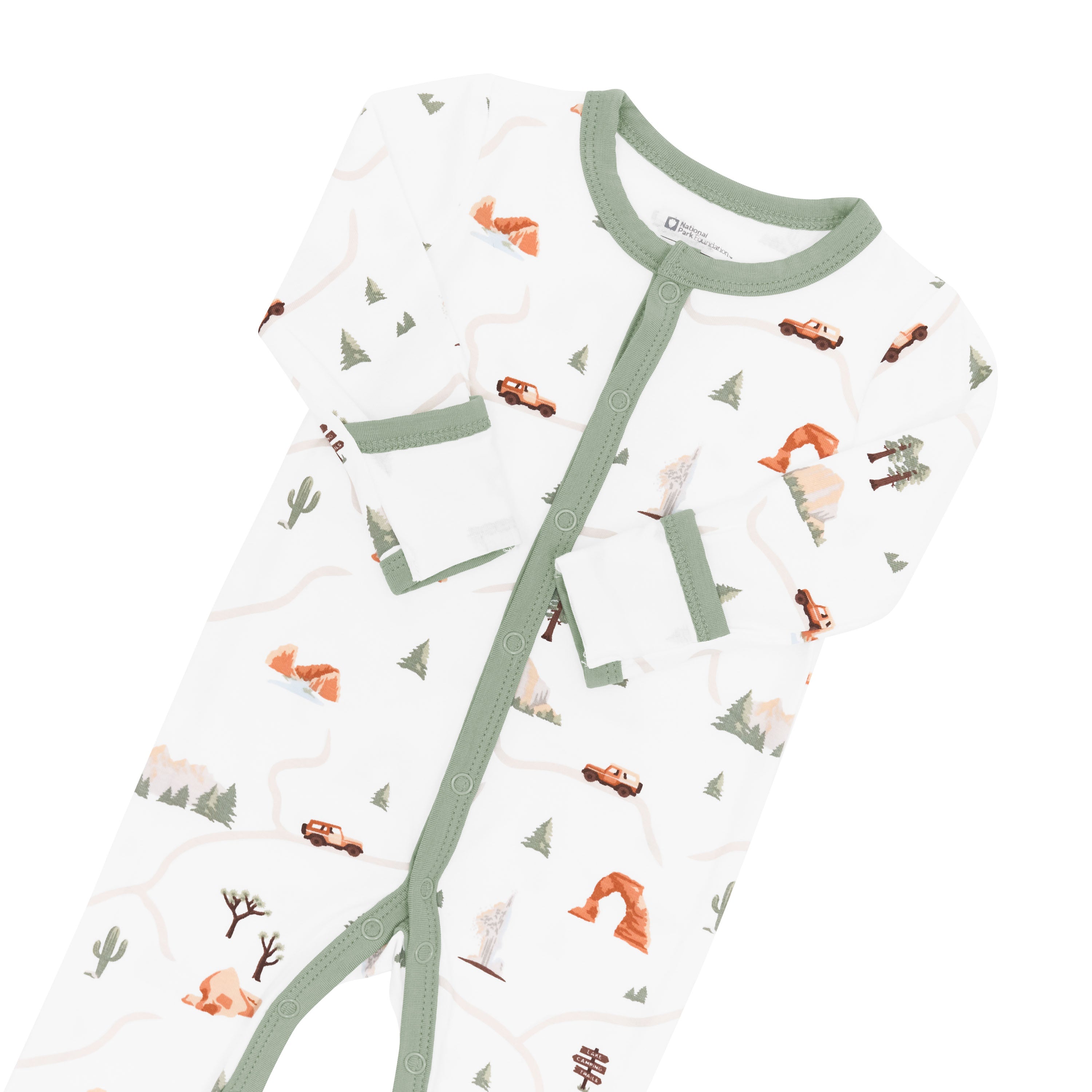 Fold over cuffs on romper pajamas in Road Trip