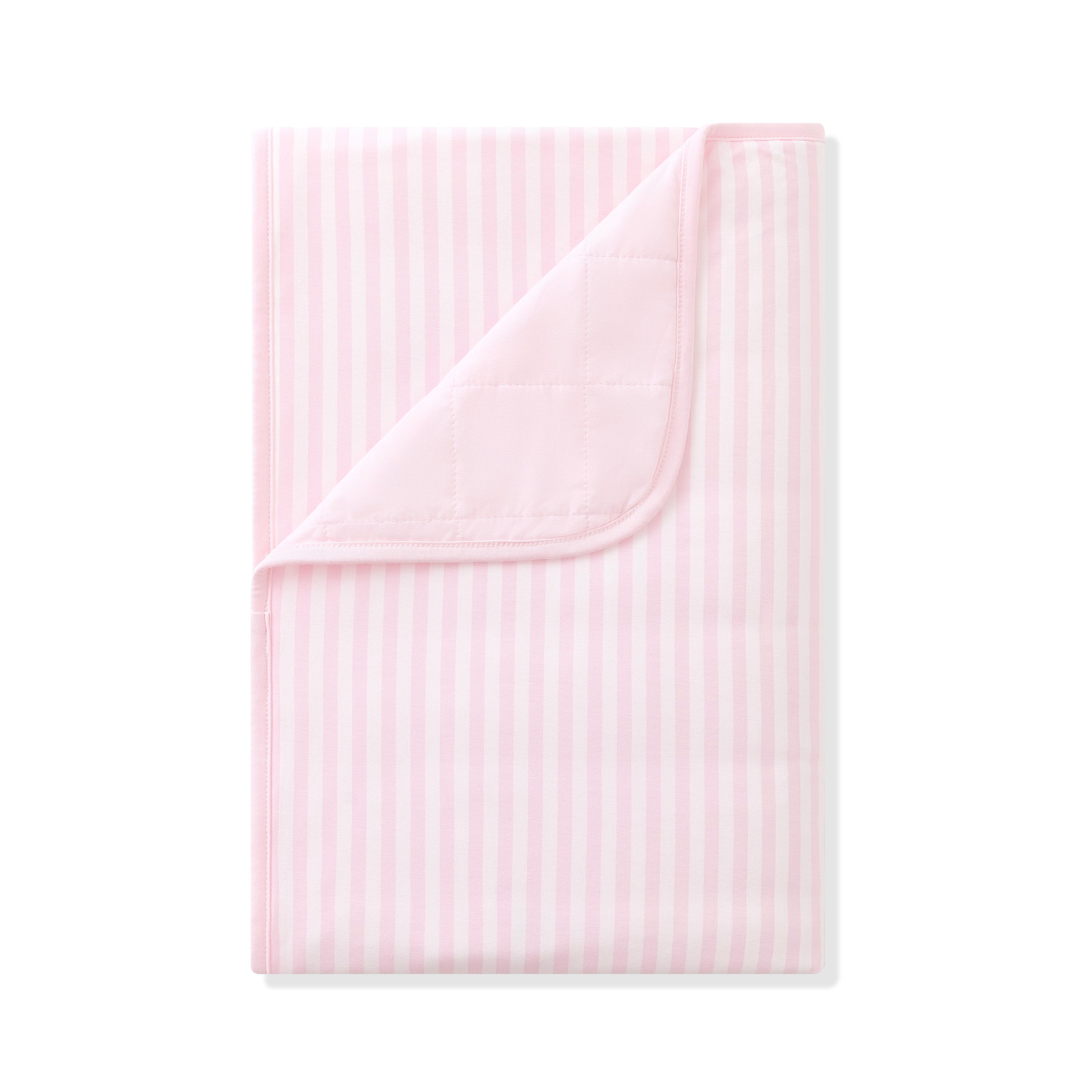 Product photo of the Toddler Blanket in Small Sakura Stripe 1.0 with the corner flipped down showing the light pink backing