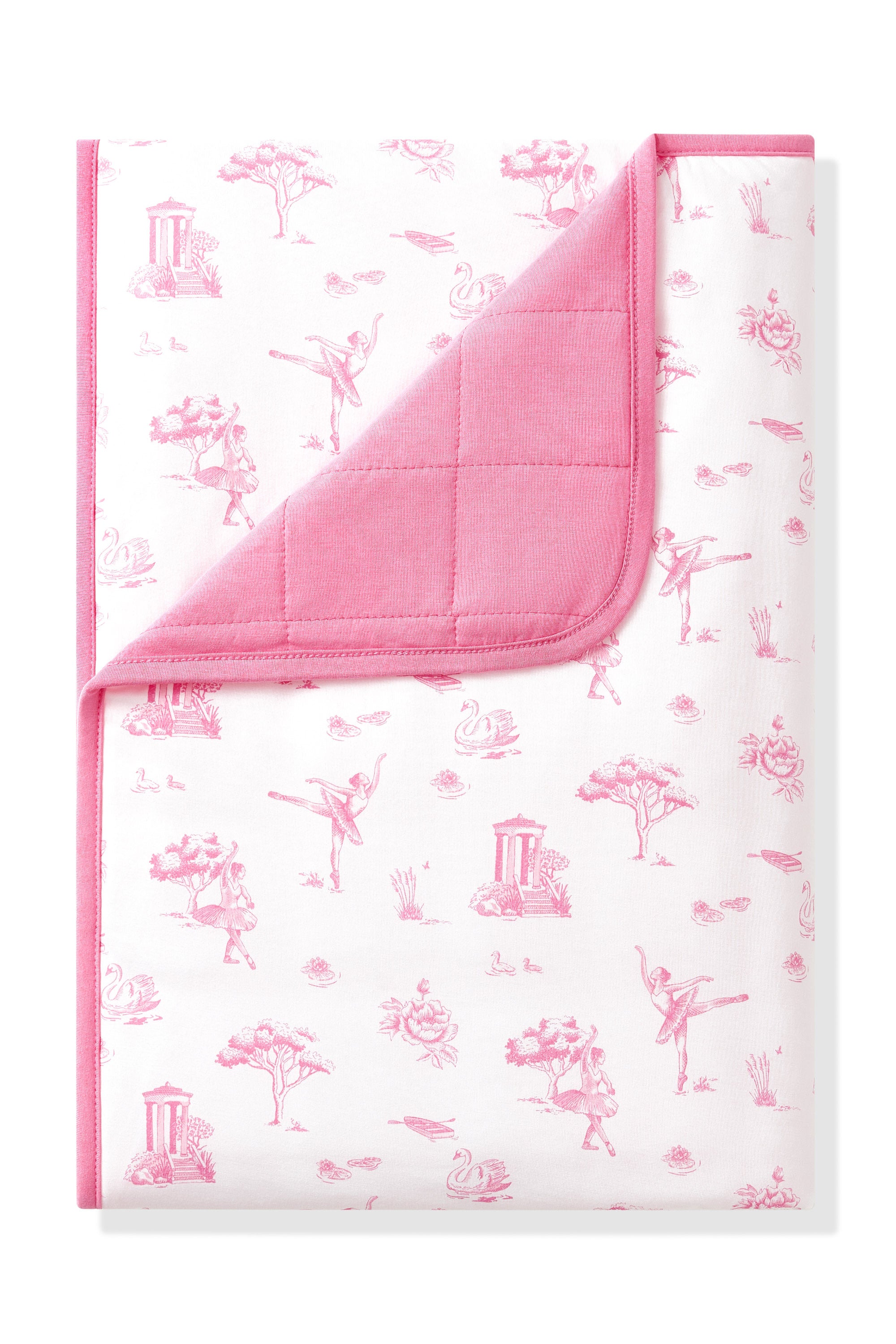 Toddler Blanket in Toile Ballet 1.0 with the corner folded down showing the dark pink backing