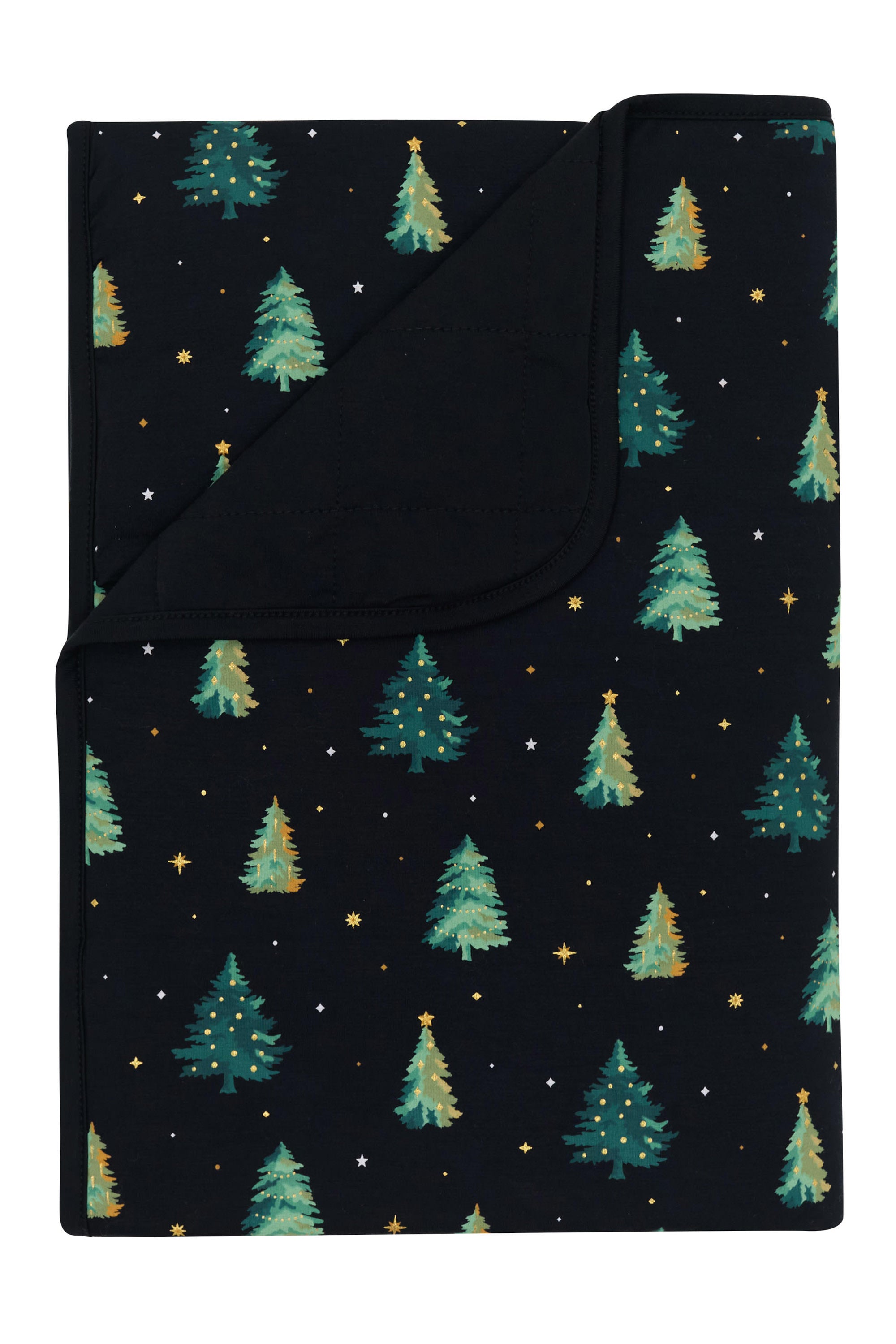 Toddler Blanket in Twinkle Tree 1.0 with the corner flipped down showing the black backing