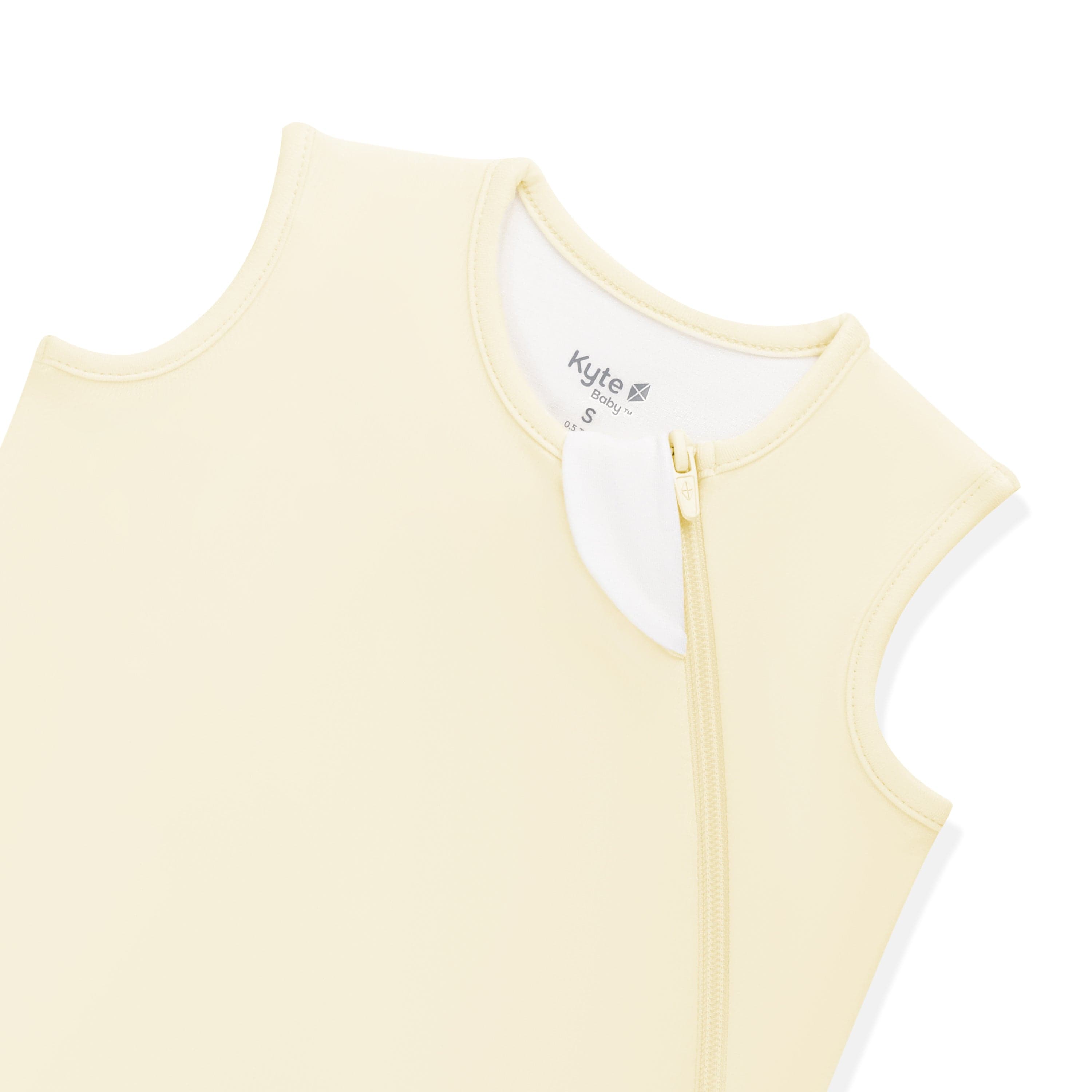 Close up of the zipper garage and top zipper shown on the Sleep Bag in Chamomile 0.5