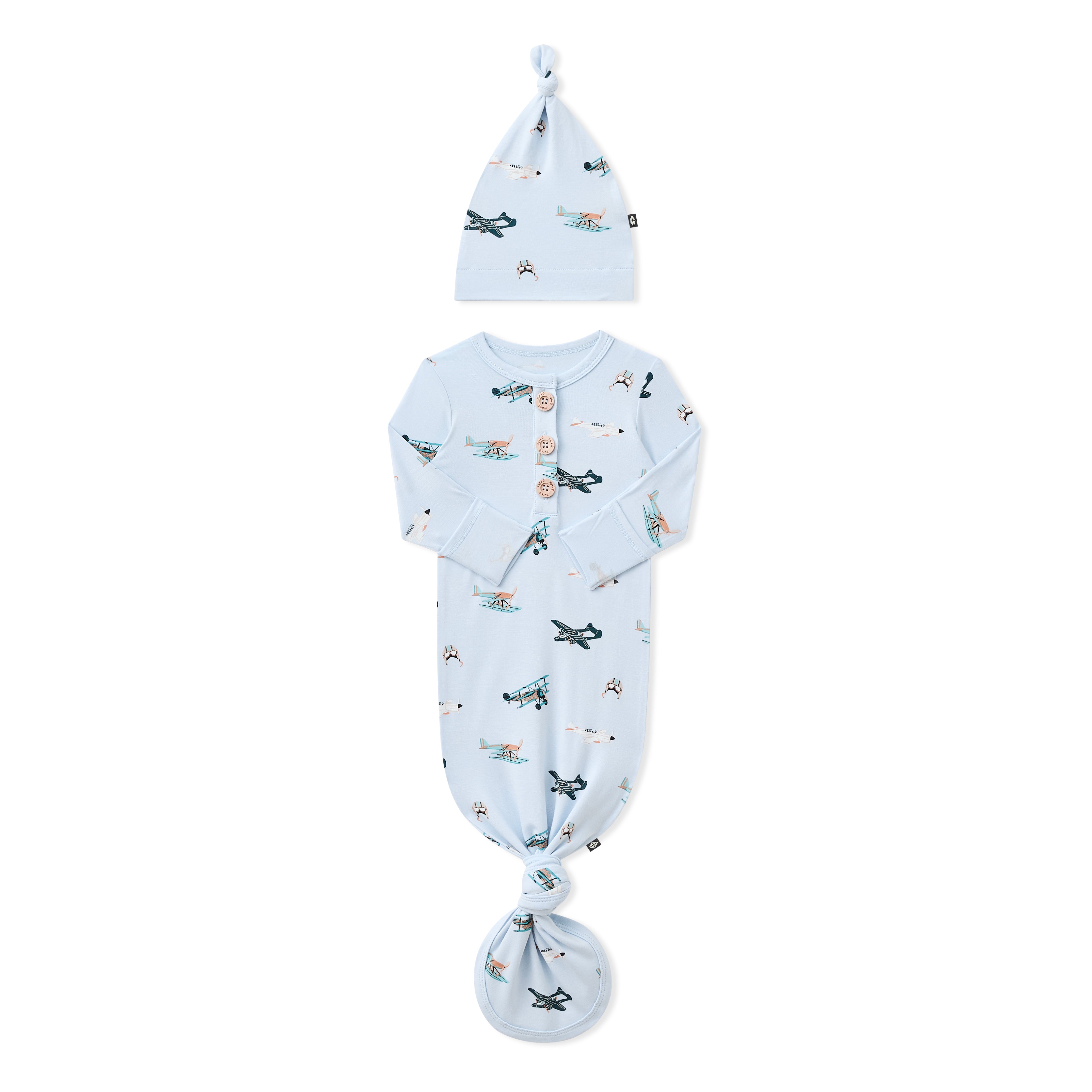 Knotted Gown with Hat Set in Take Off shown with the arms folded inwards