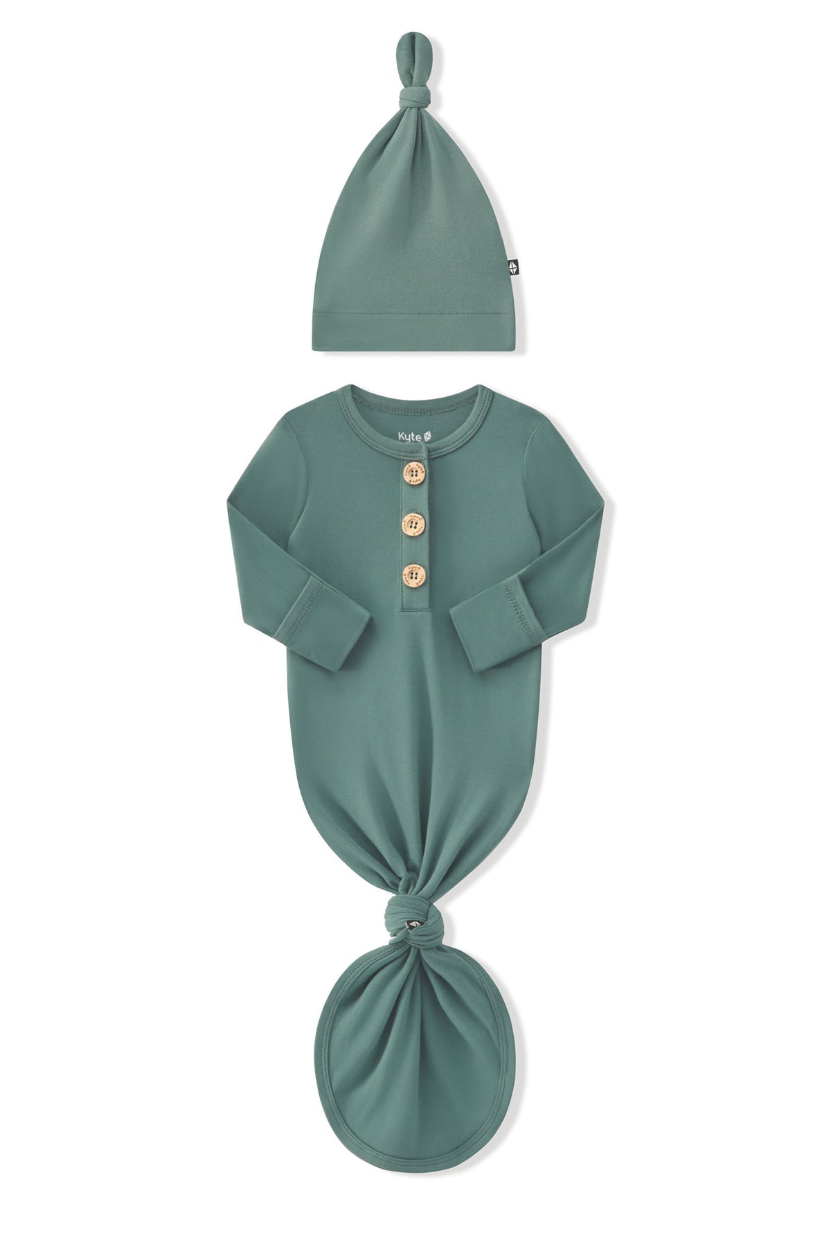 Arms of the Long Sleeve Bodysuit in Pine folded inward showing the fold over hand cuffs on a white background