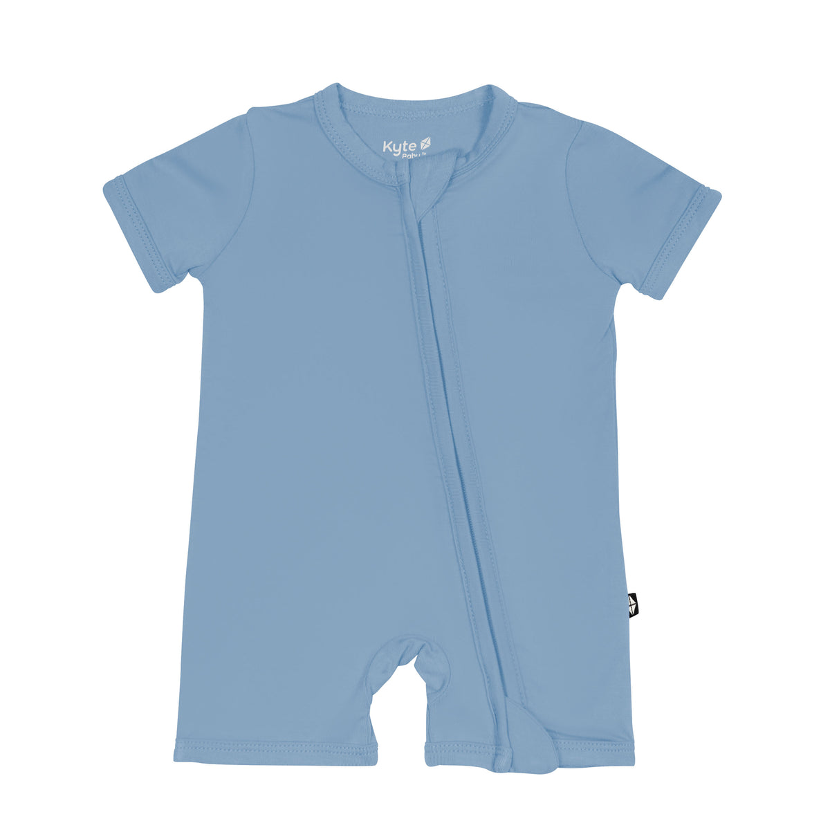 Flat lay of Kyte Baby Zippered Shortall Romper in Slate