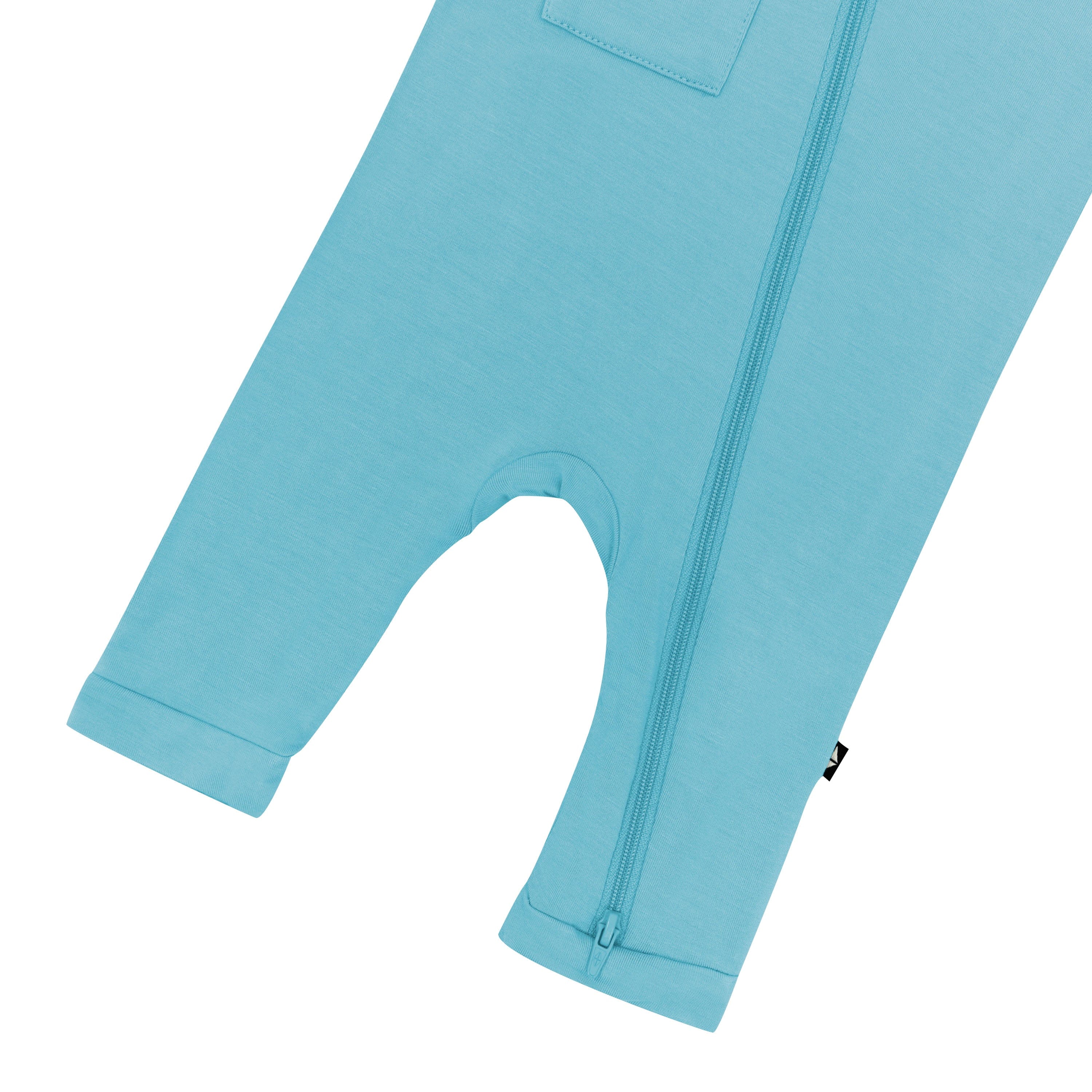 Capri length Kyte Baby Sleeveless Zippered Romper in Makai