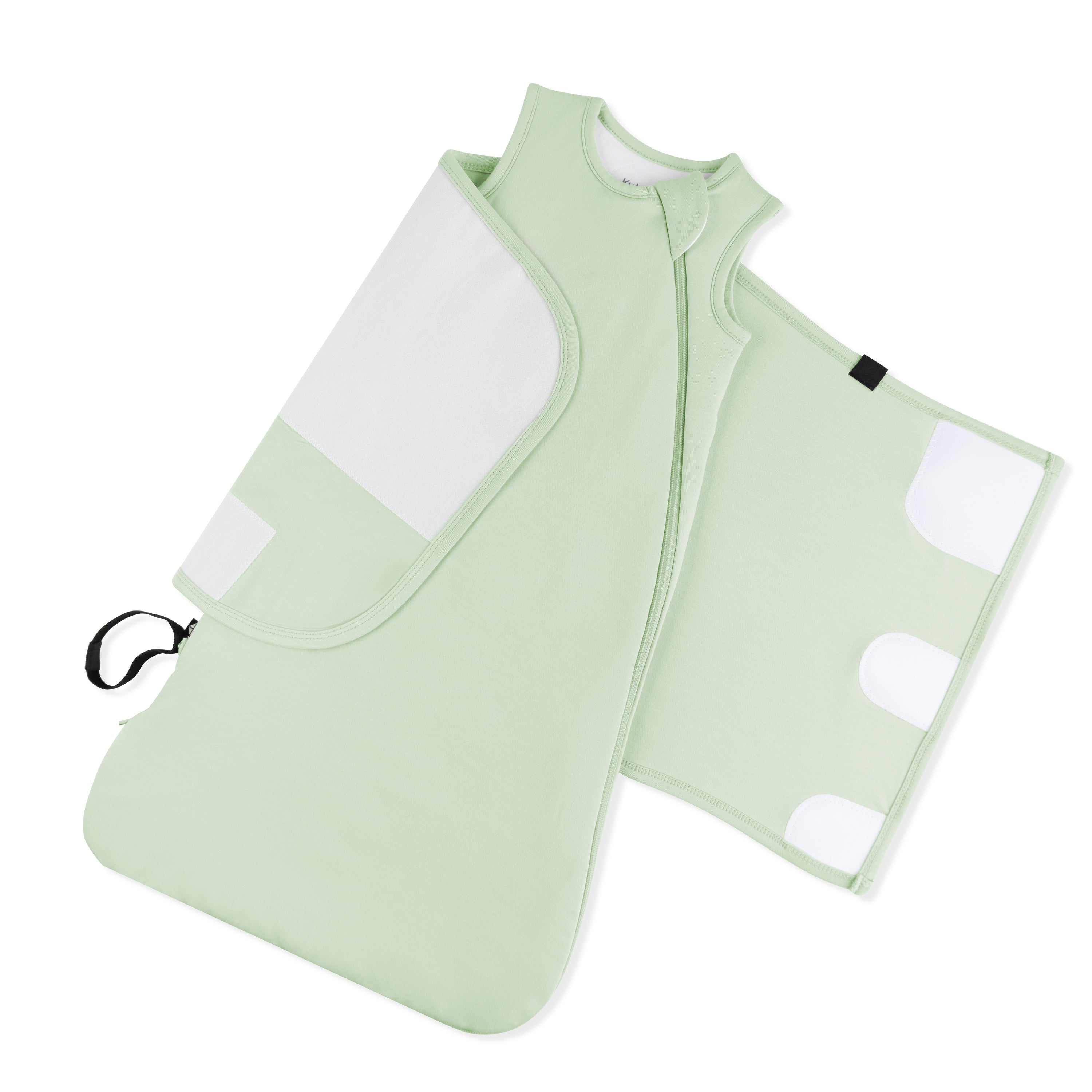 Adjustable velcro shown on an unswaddled Sleep Bag Swaddler in Basil 1.0