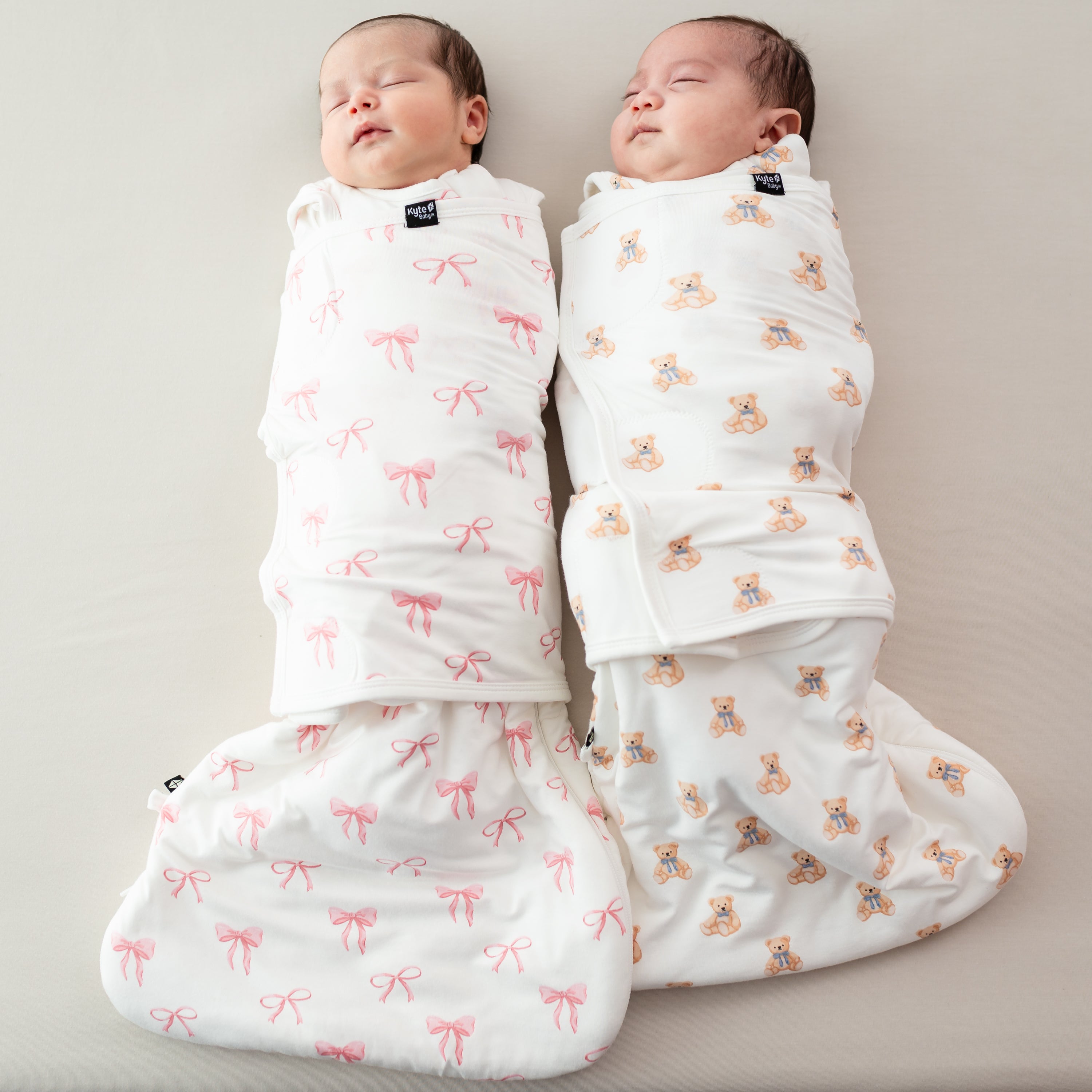 Babies sleeping in Sleep Bag Swaddlers in Bow and Teddy Bear