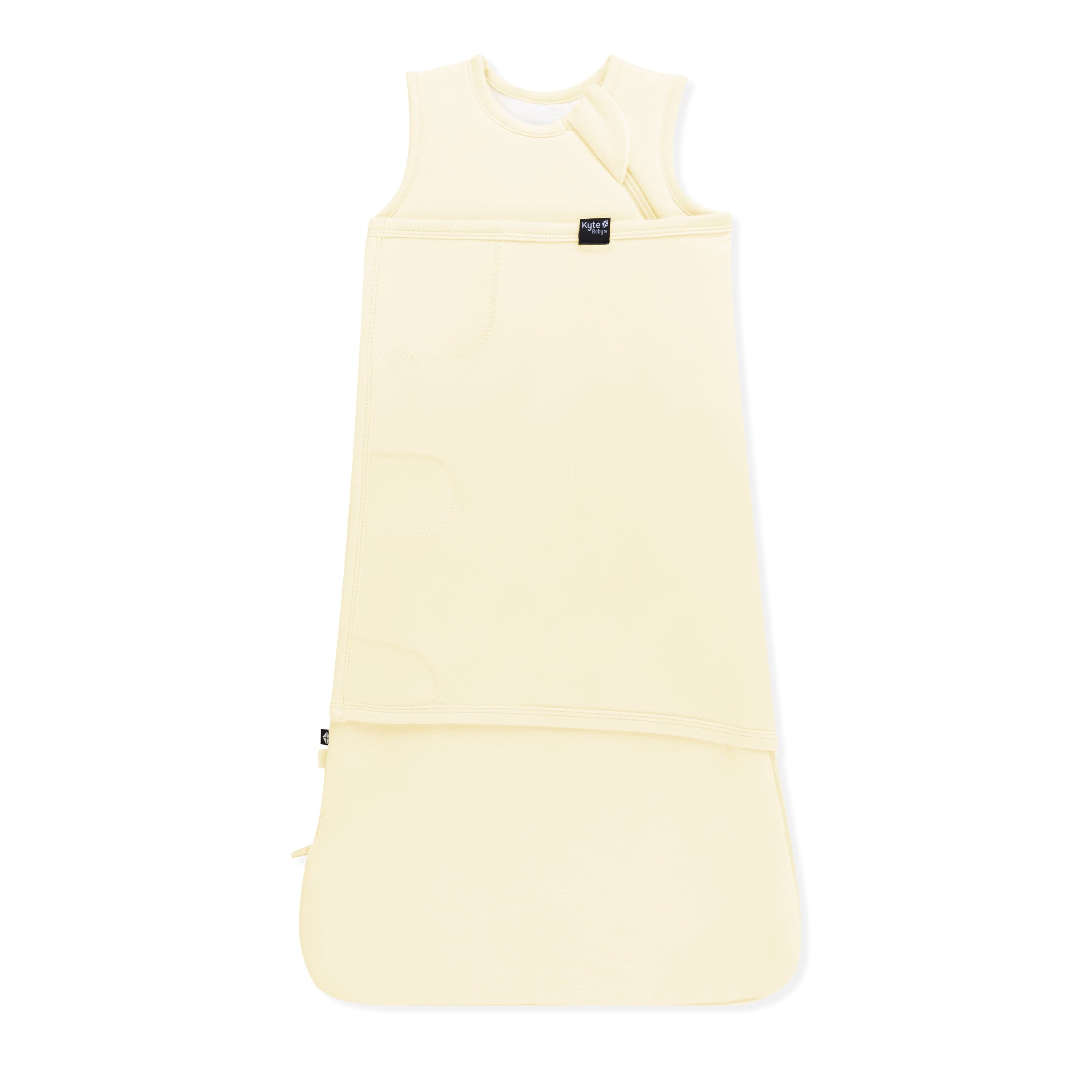 Sleep Bag Swaddler in Chamomile 1.0 shown swaddled on a white background