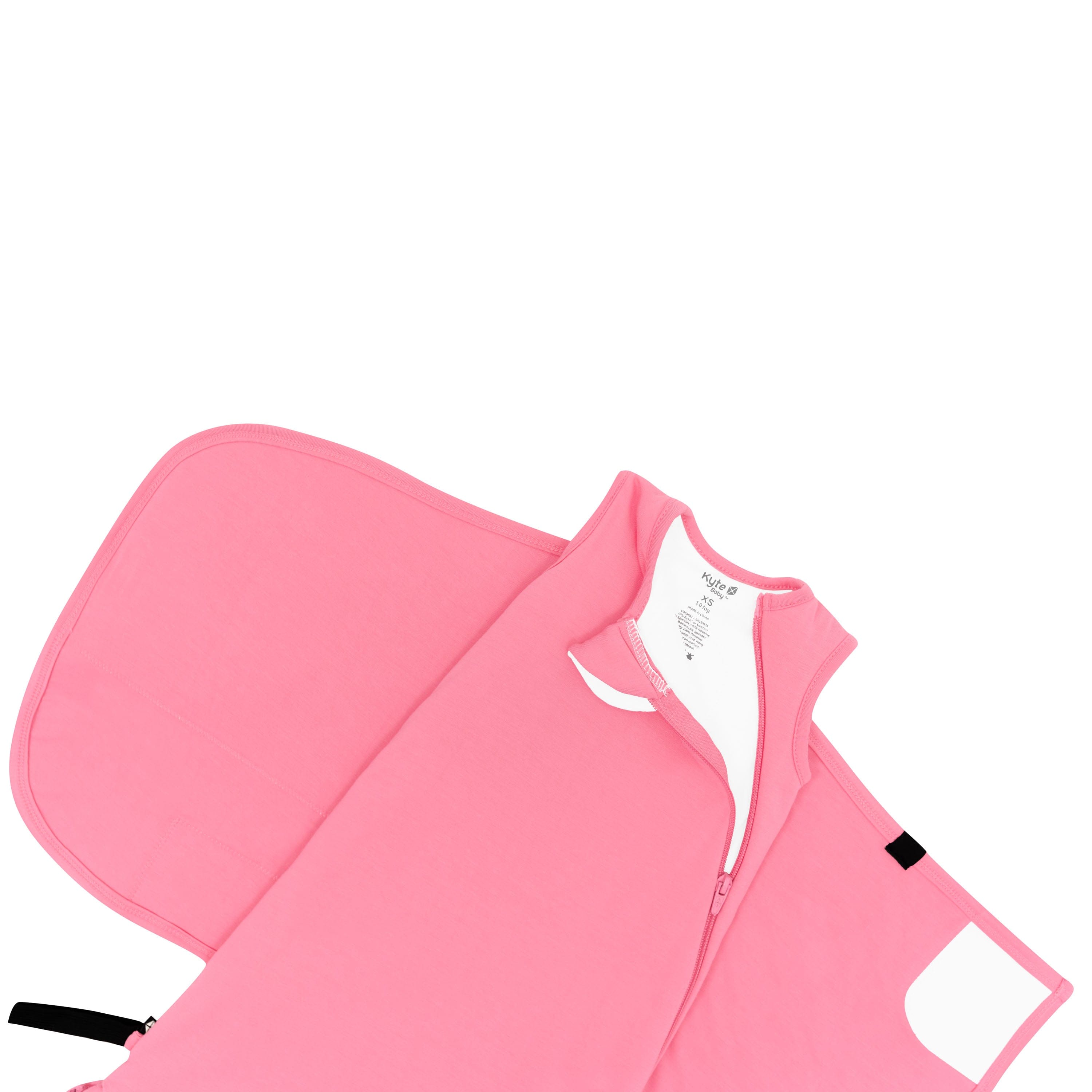 Kyte Baby Sleep Bag Swaddler in Guava shown unswaddled with zipper unzipped at top
