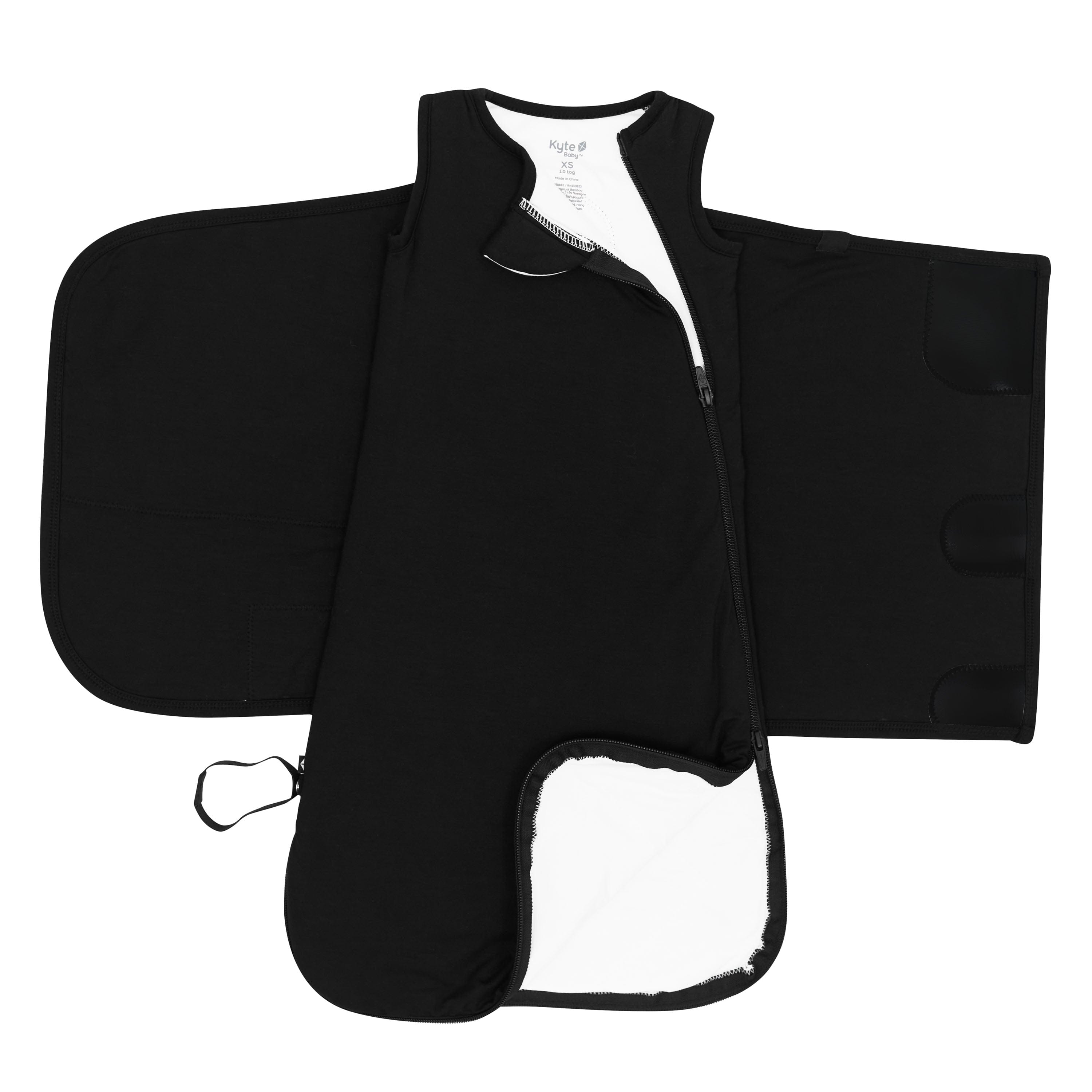 Zipper garage, double zipper and adjustable velcro shown on an unswaddled Sleep Bag Swaddler in Midnight 1.0