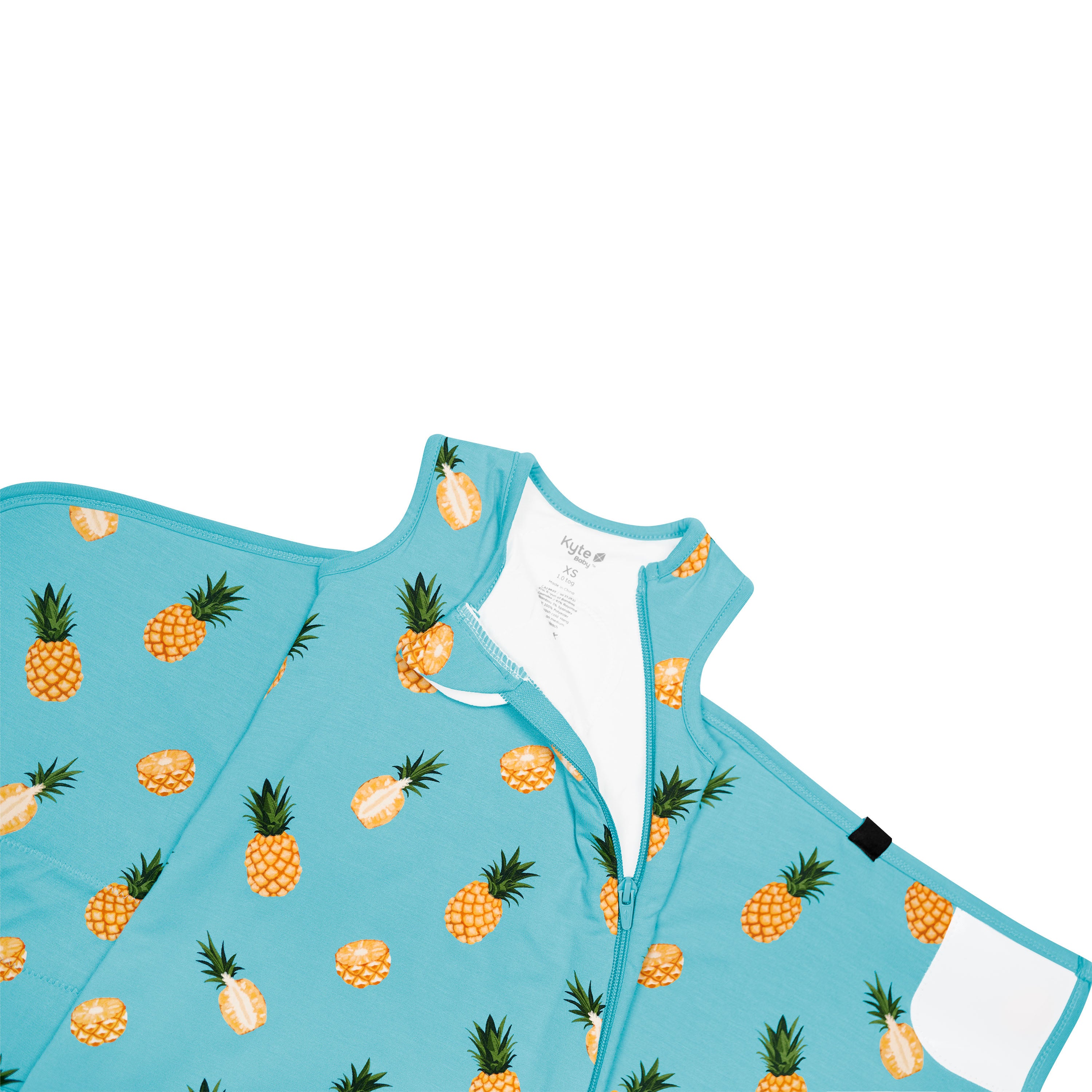Sleep Bag Swaddler in Pineapple 1.0 close up on zipper garage and top zipper