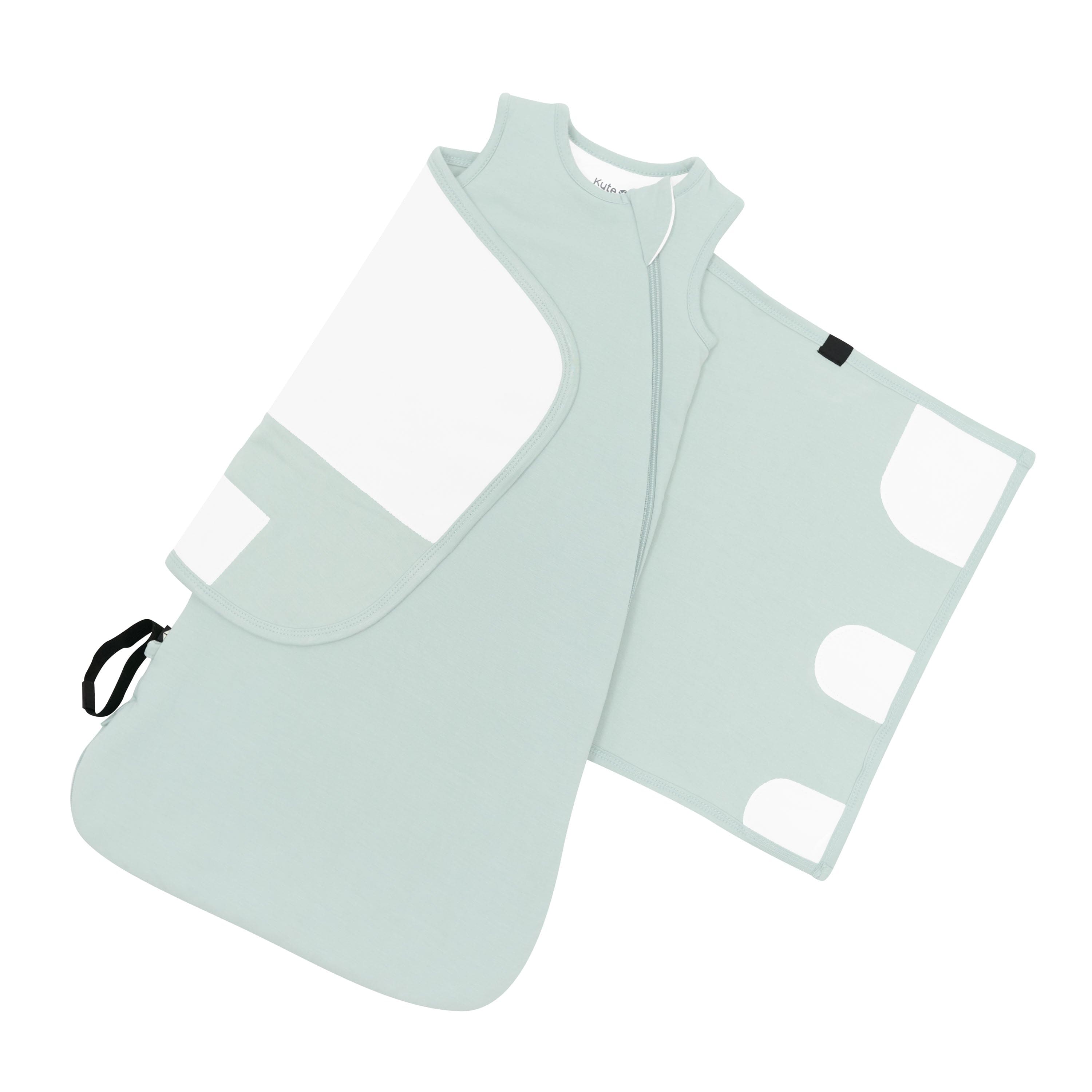 Adjustable velcro swaddle band shown on the Sleep Bag Swaddler in Sage 1.0