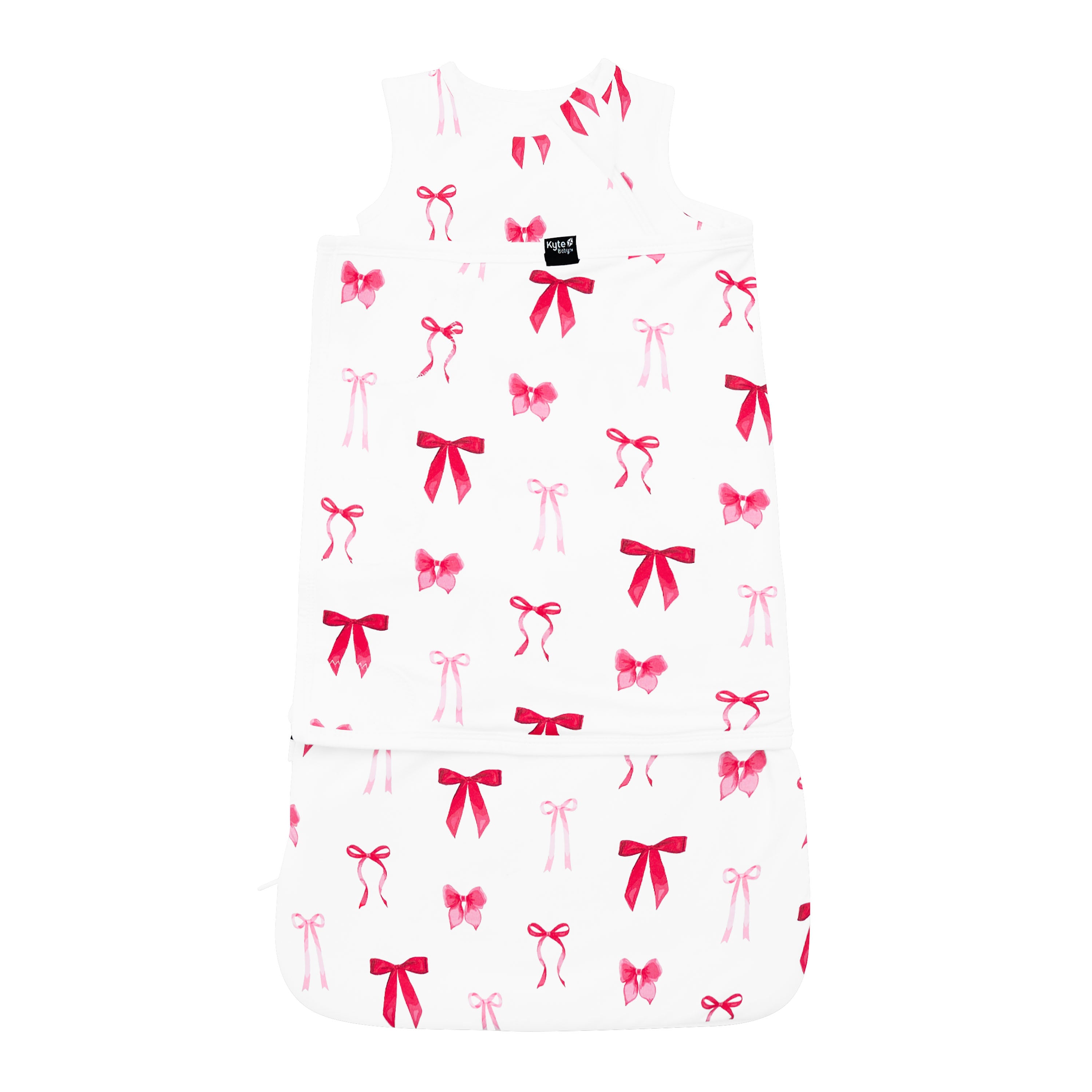 Product photo of the breathable and stretchy Sleep Bag Swaddler in Small Love Bow 1.0 shown swaddled