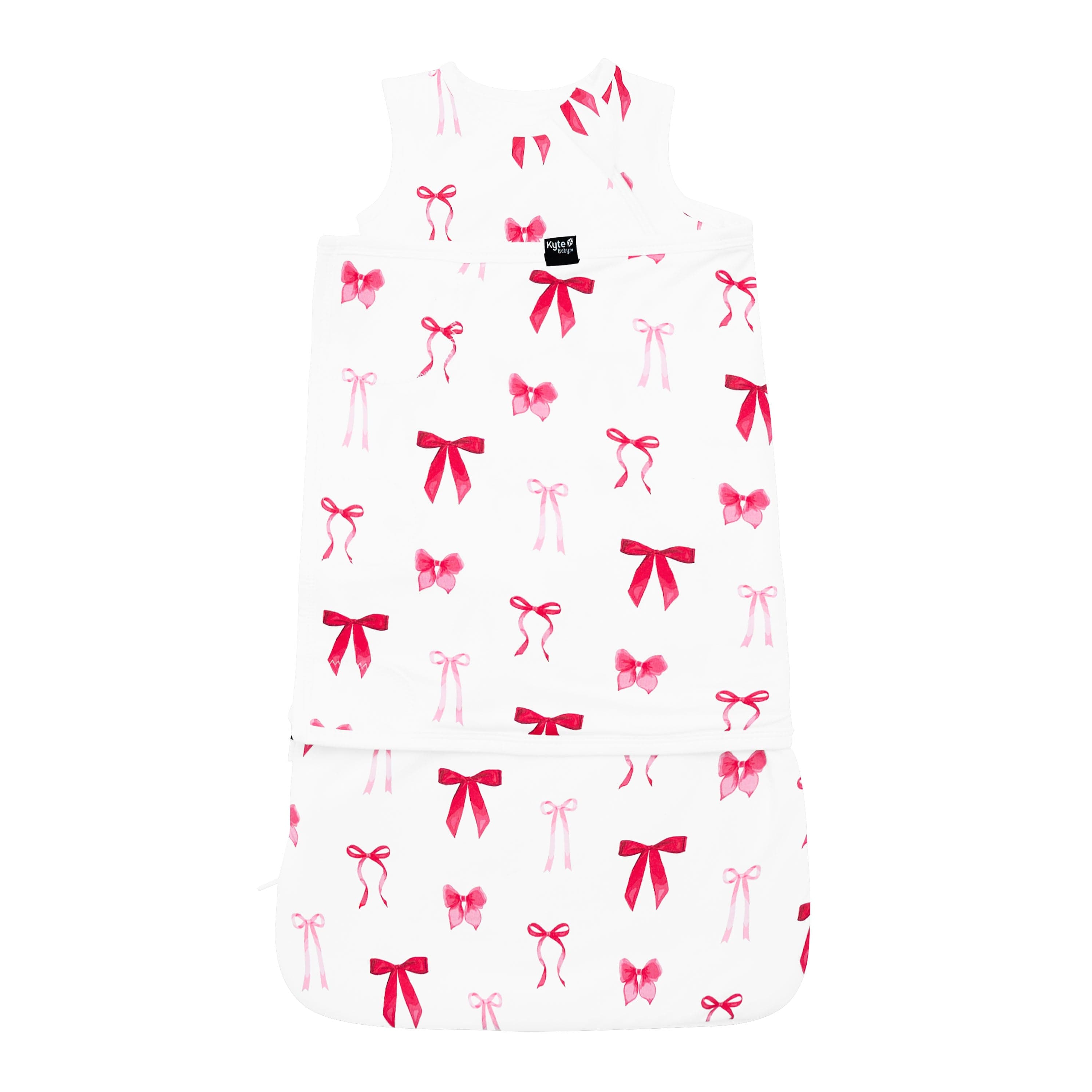 Product photo of the breathable and stretchy Sleep Bag Swaddler in Small Love Bow 1.0 shown swaddled