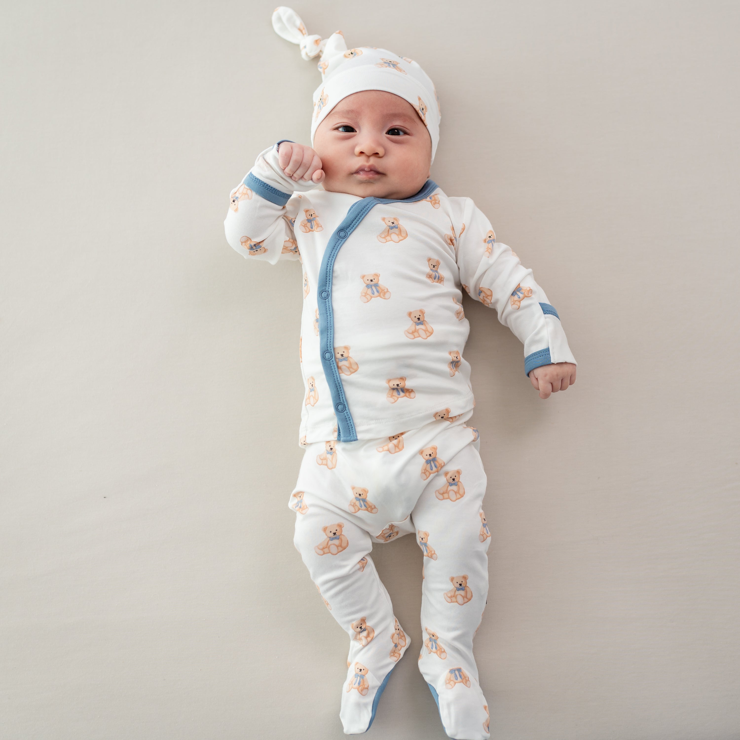 Baby wearing Take Me Home Set with Cap in Teddy Bear