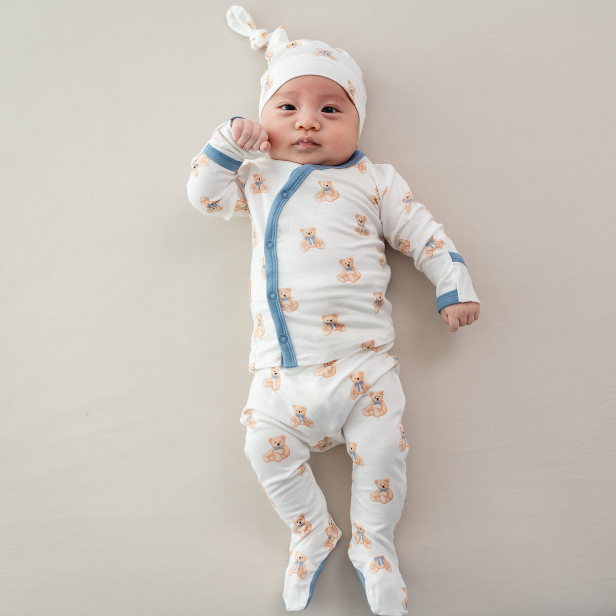 Baby wearing Take Me Home Set with Cap in Teddy Bear