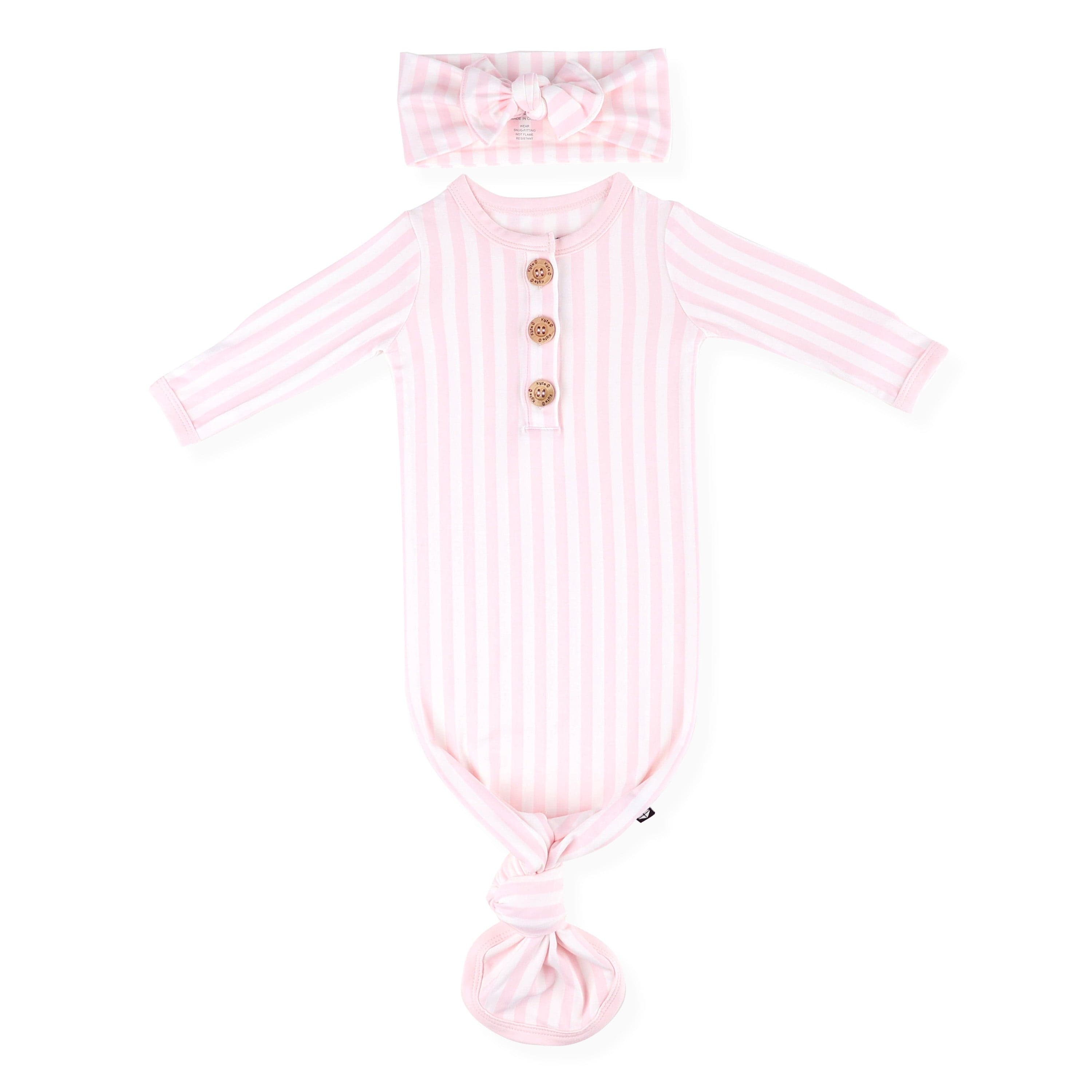 Product photo of the Knotted Gown with Bow Set in Small Sakura Stripe with the arms laid flat out on a white surface
