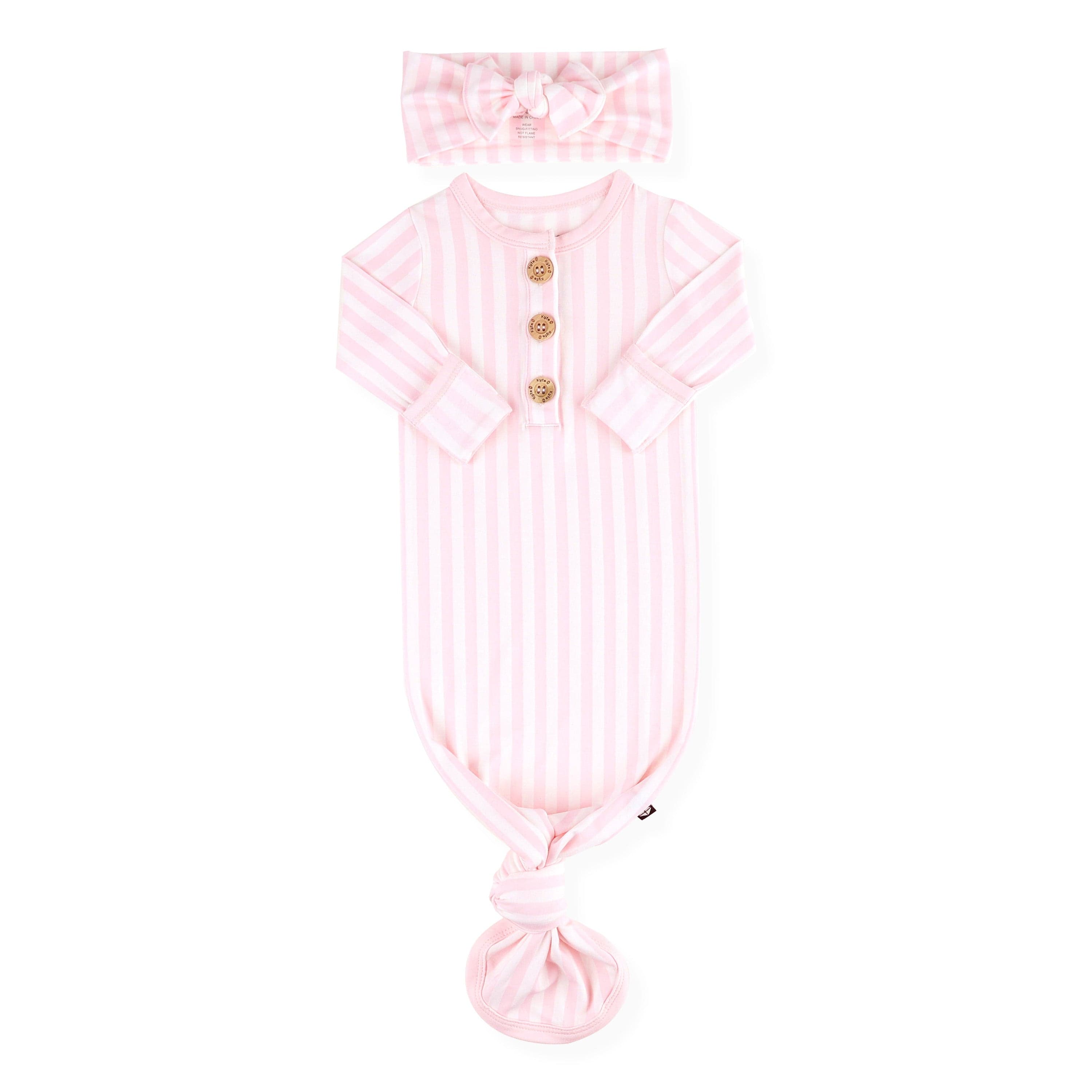 Product photo of the Knotted Gown with Bow Set in Small Sakura Stripe with the arms folded inwards shown on a white surface