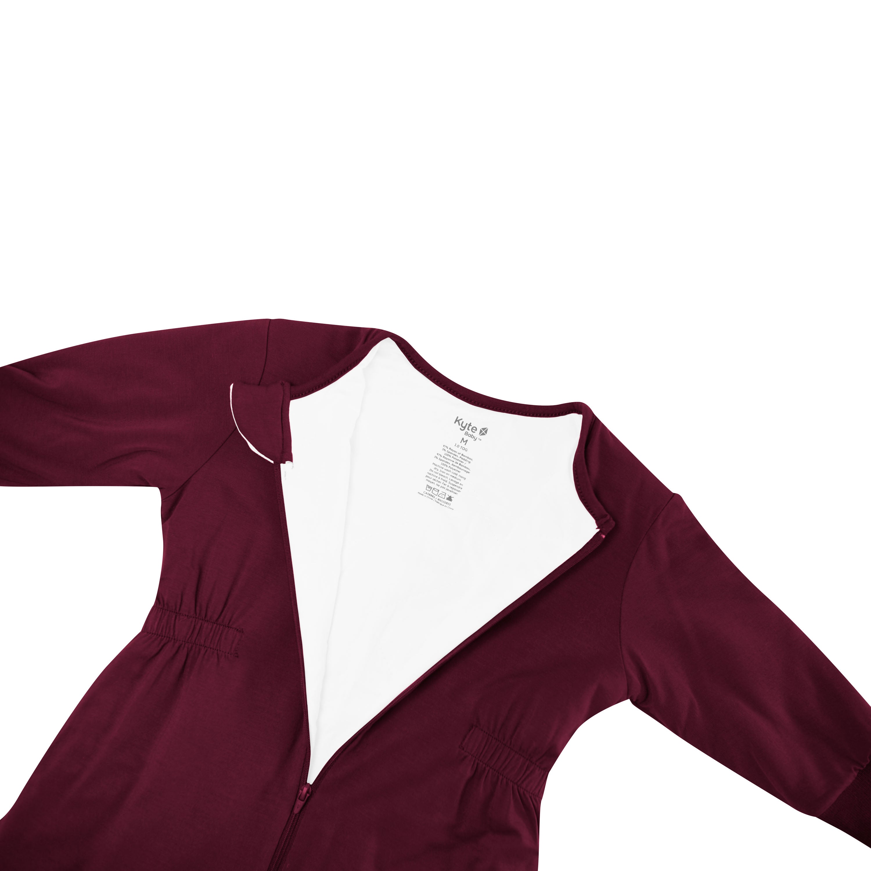 Close up photo of the zipper garage and top zipper undone on the Cozy Playsuit in Burgundy