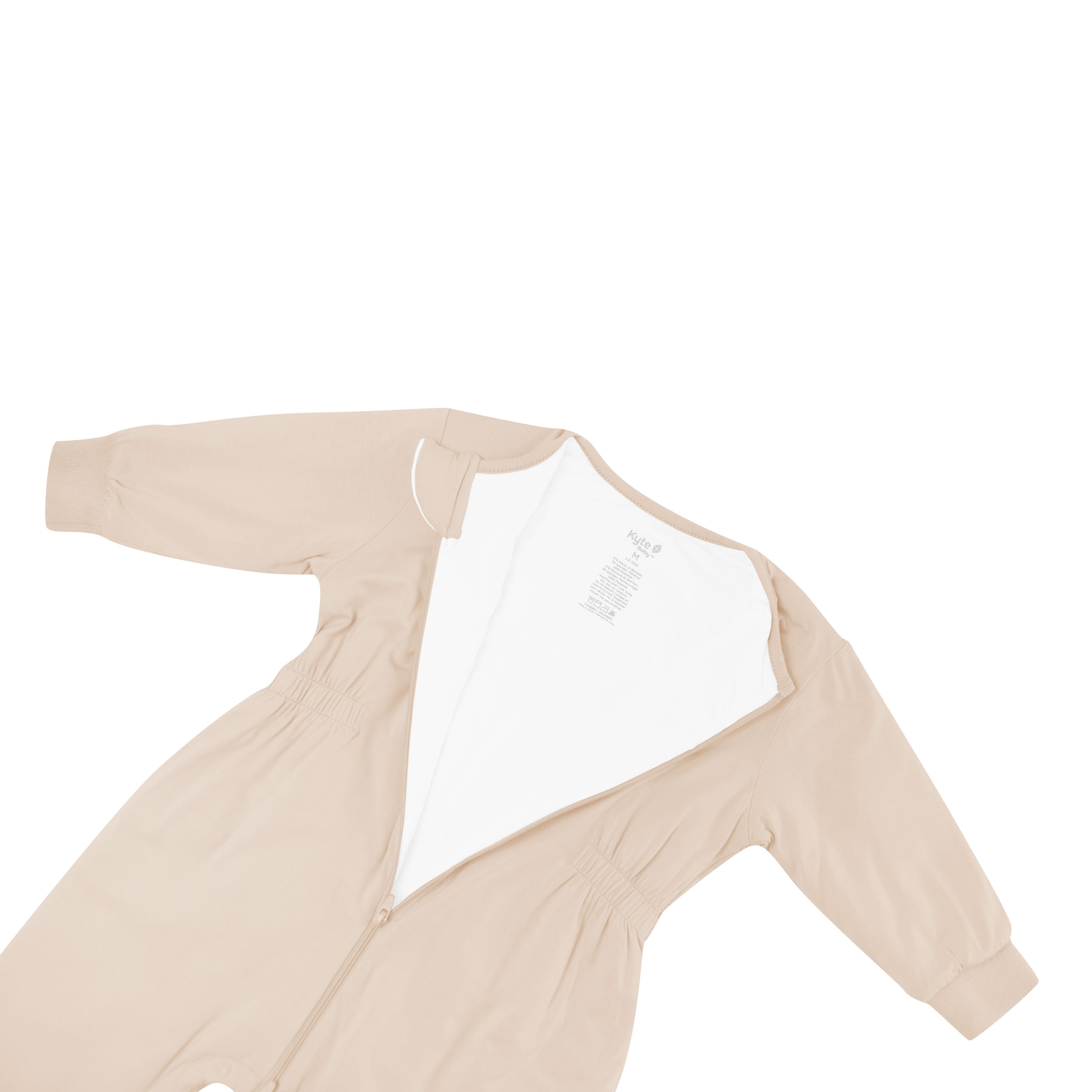 Close up of the zipper garage and top zipper undone on the Cozy Playsuit in Bisque