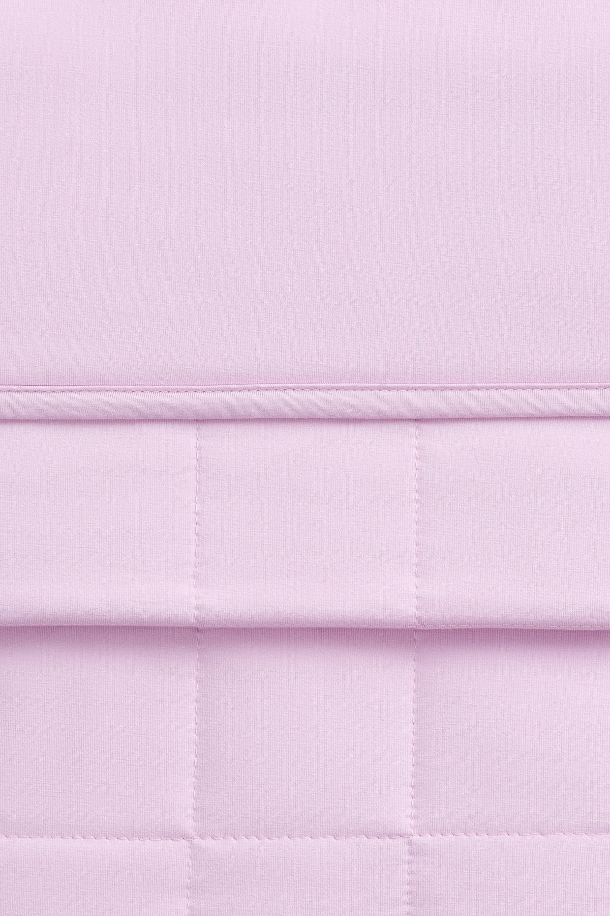 Close-up of a light purple bamboo quilt