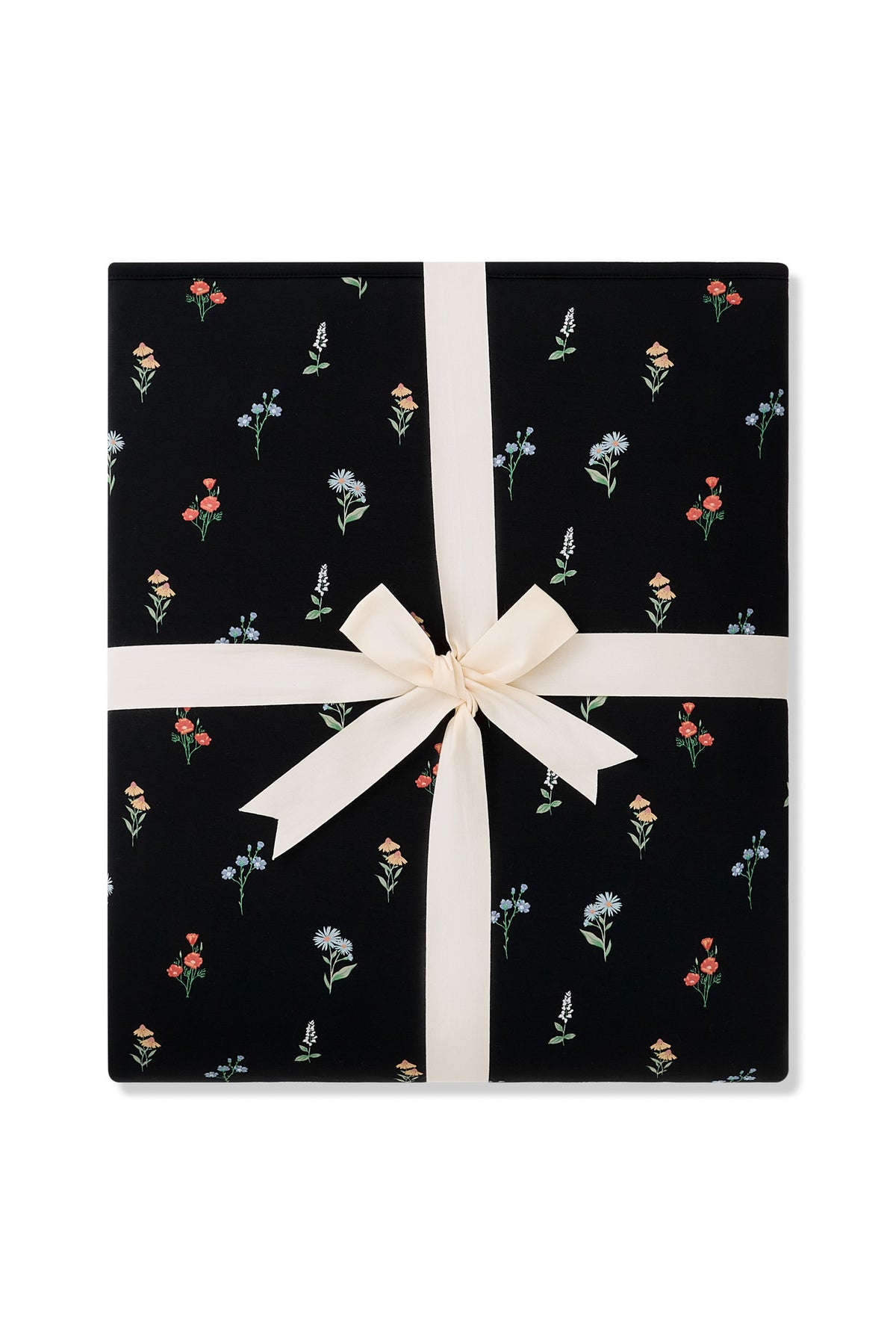 Black Adult Quilted Blanket in Wildflower 2.5 print packed with a ribbon on a white background