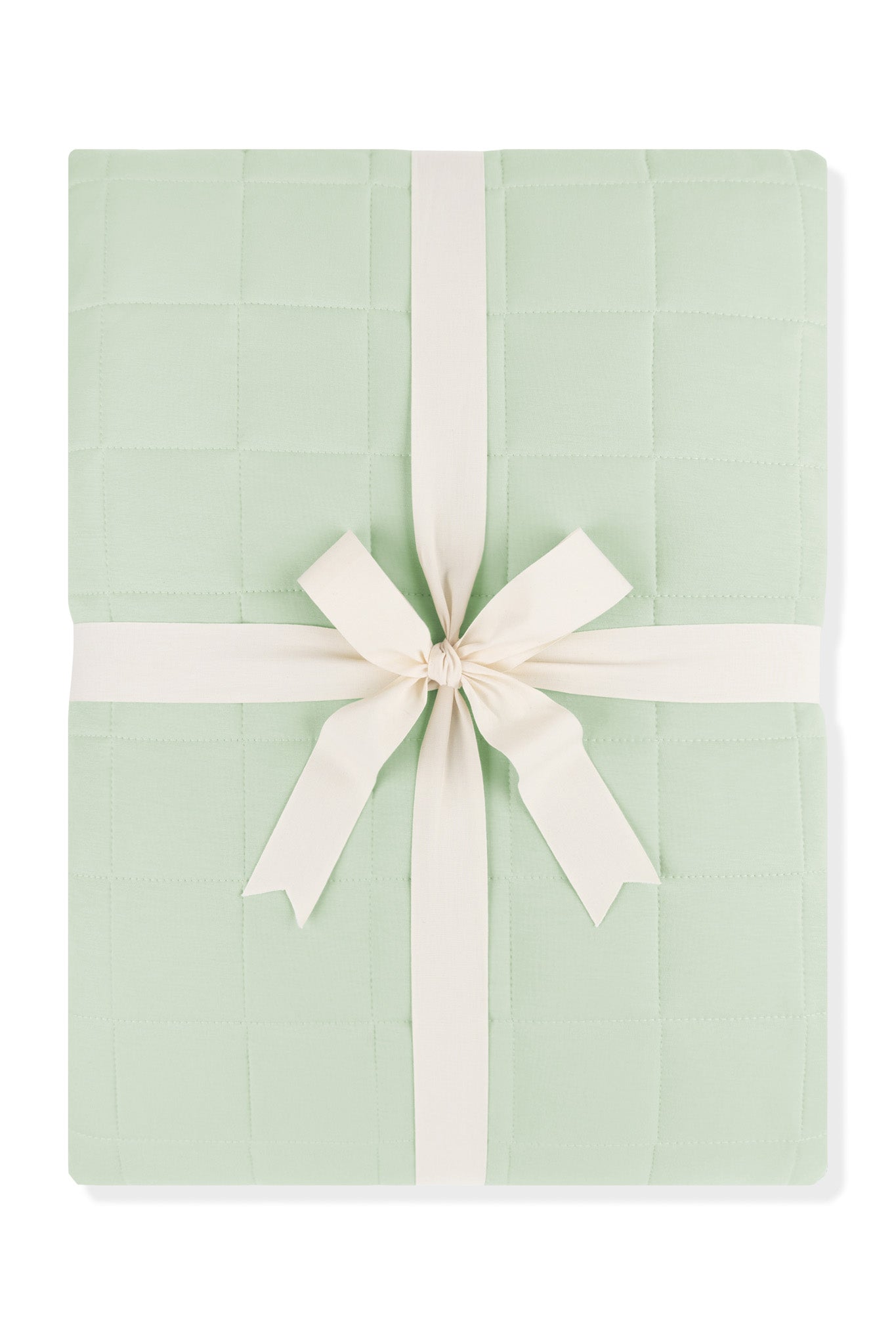 Adult Quilted Blanket in Basil 2.5 in its packaging shown tied in a linen bow