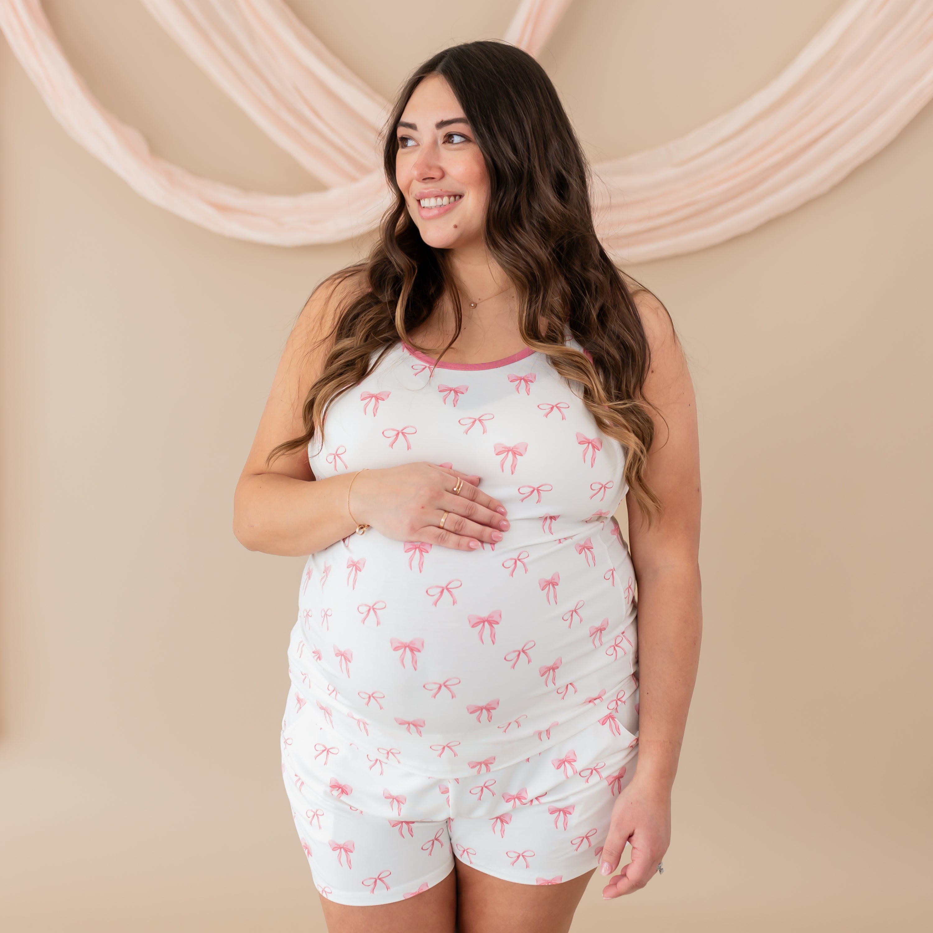 Pregnant woman modeling Women’s Tank Set in Bow