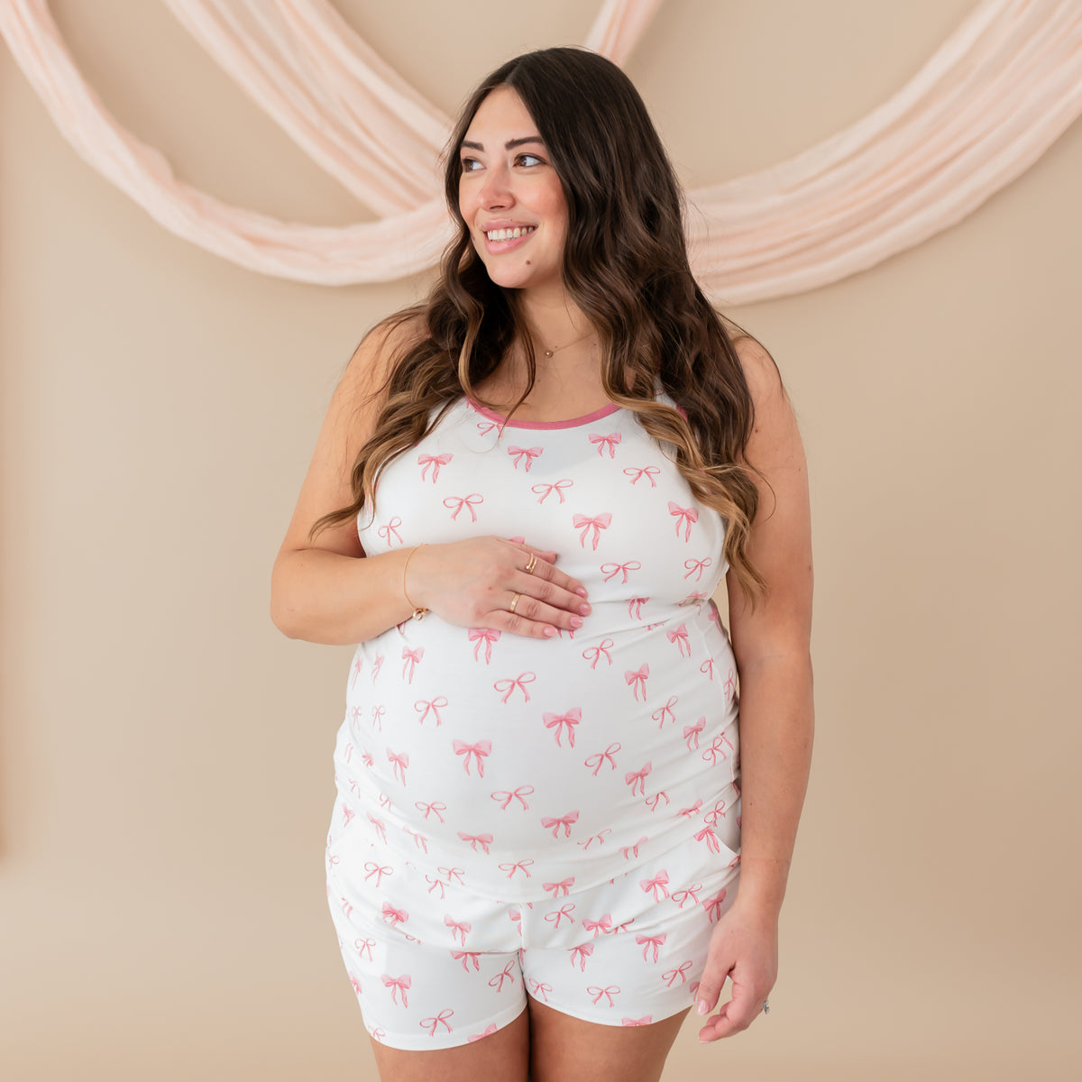 Pregnant woman modeling Women’s Tank Set in Bow