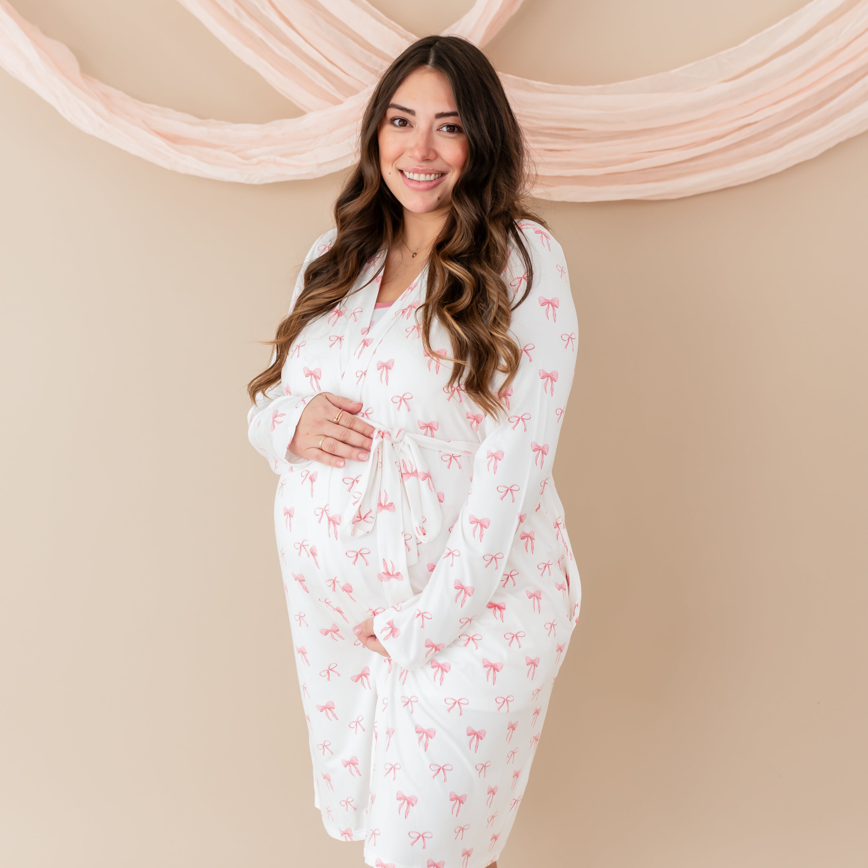 Pregnant woman modeling Women’s Lounge Robe in Bow with robe tied