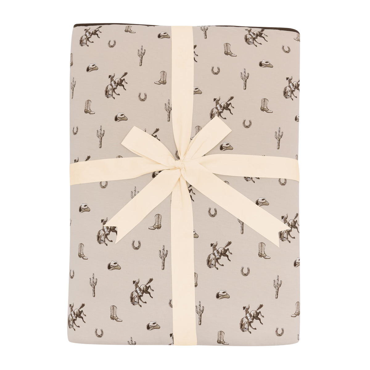 Youth Blanket in Classic Cowboy 2.5 shown tied in its packaging with a linen bow