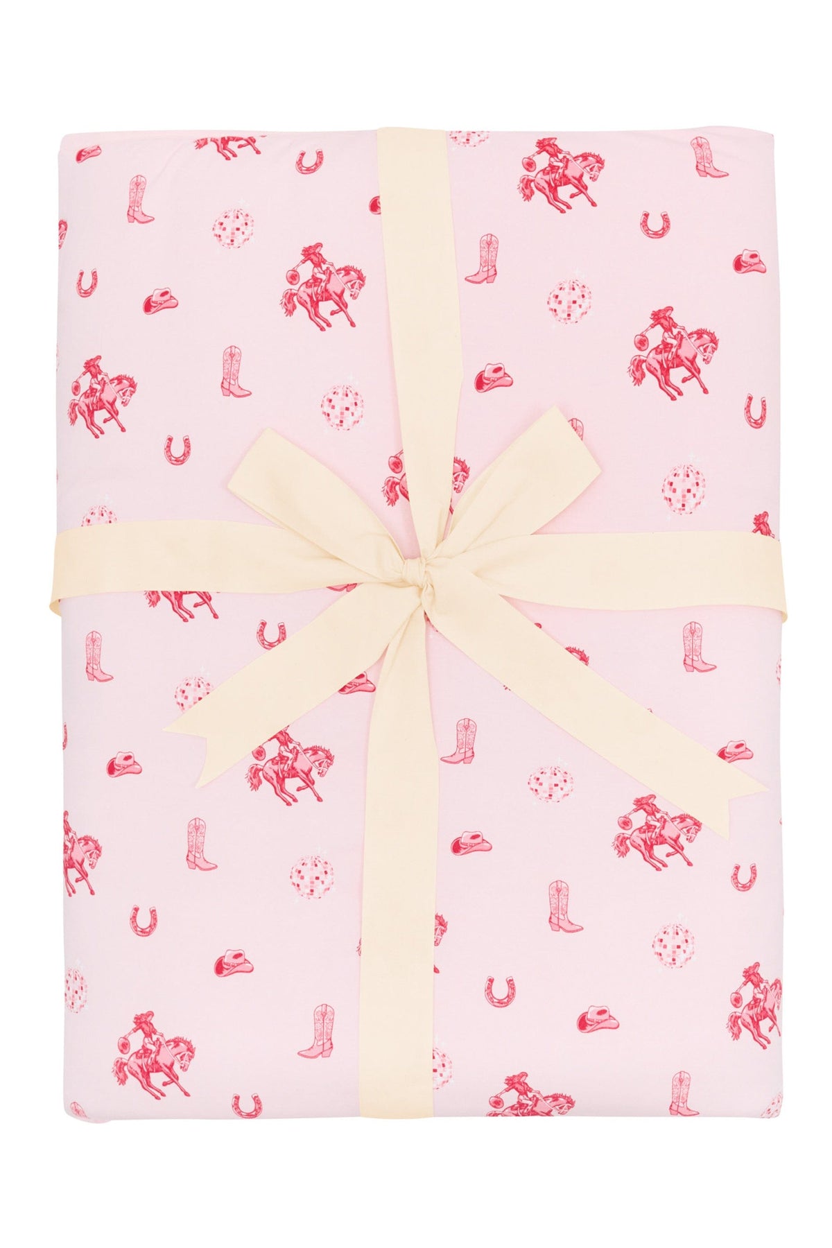 Youth Blanket in Disco Cowgirl 2.5 shown wrapped in its packaging with a linen bow