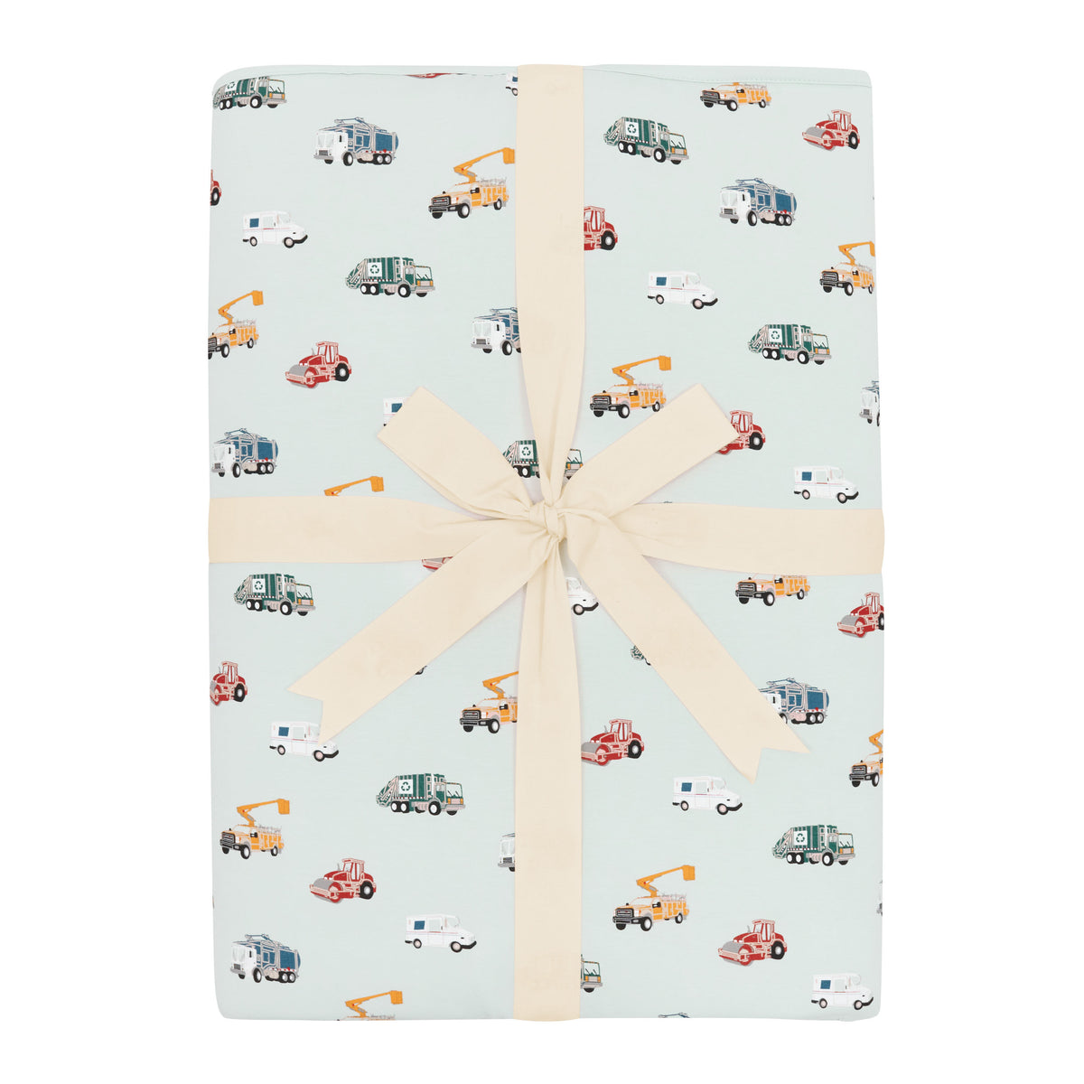 Youth Blanket in City Vehicles 2.5 shown in its packaging tied in a linen bow
