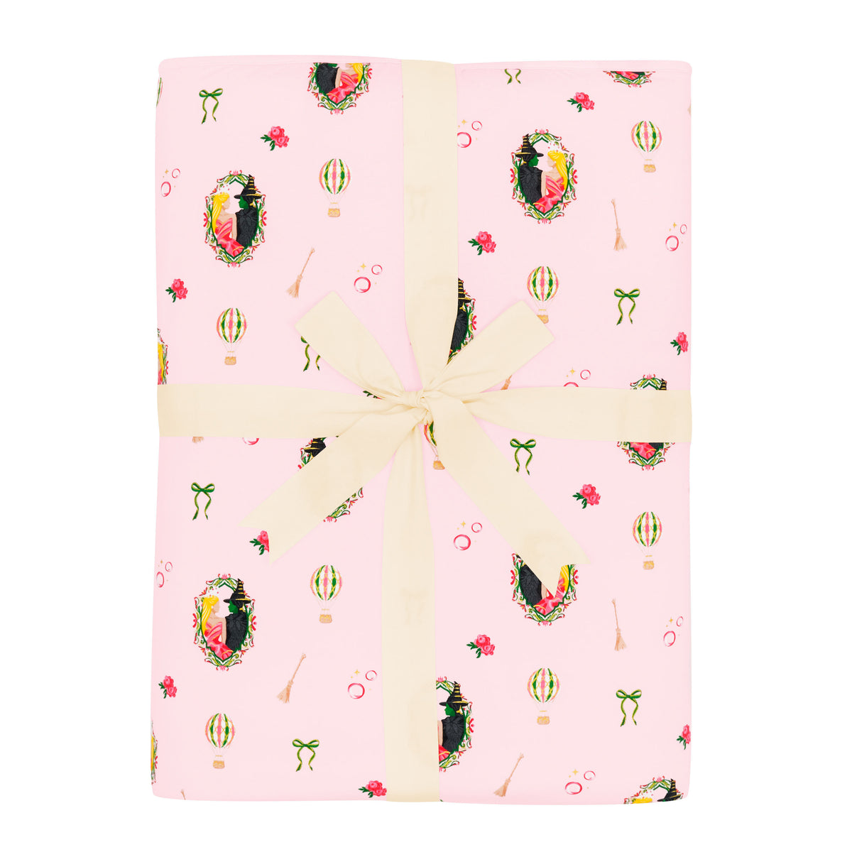 Youth Blanket in Wicked 2.5 shown in its packaging tied in a linen bow