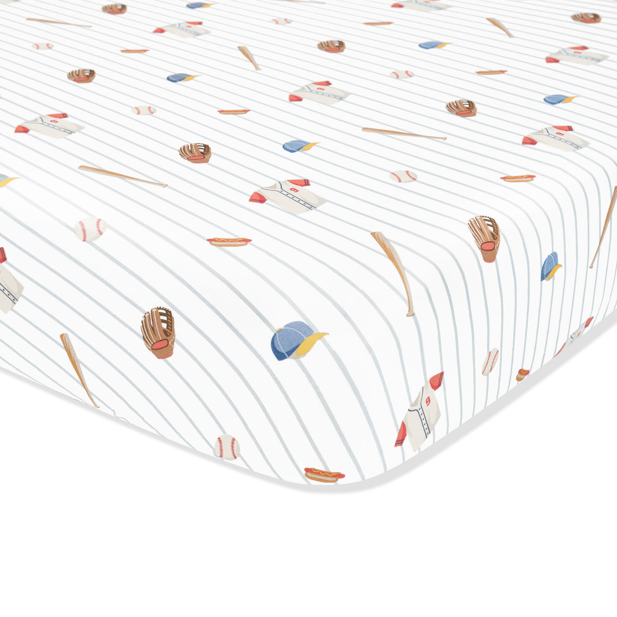 Corner of the Mini Crib Sheet in Home Run shown on a crib mattress